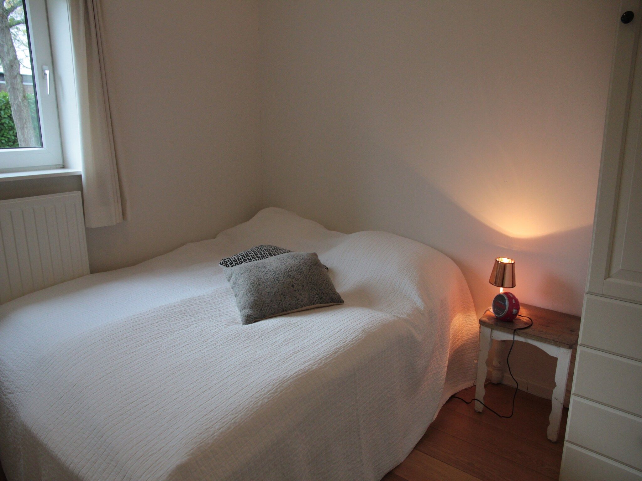 Een slaapkamer van Zwanenlaan 13 in Kamperland