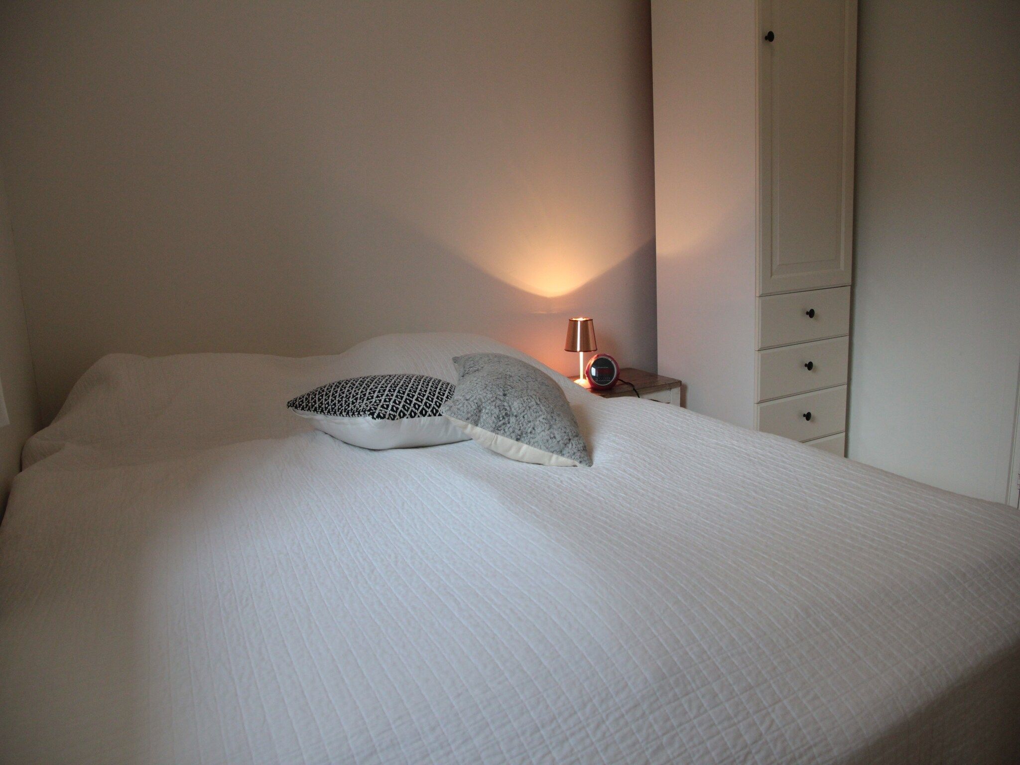 Een slaapkamer van Zwanenlaan 13 in Kamperland