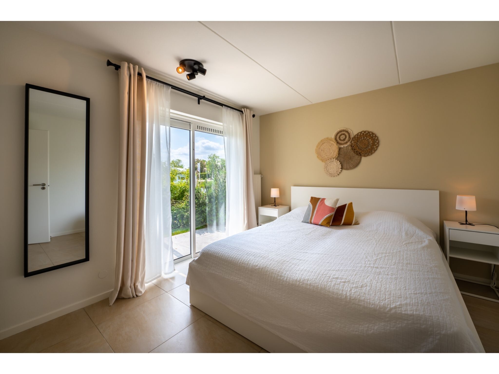 Een slaapkamer van Veerdam 42 in Kortgene