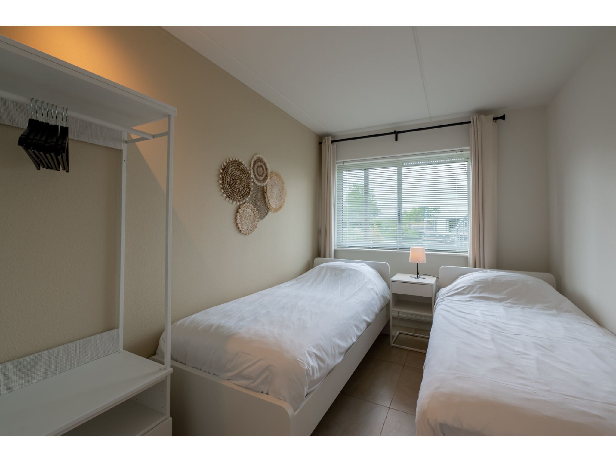 Een slaapkamer van Veerdam 42 in Kortgene