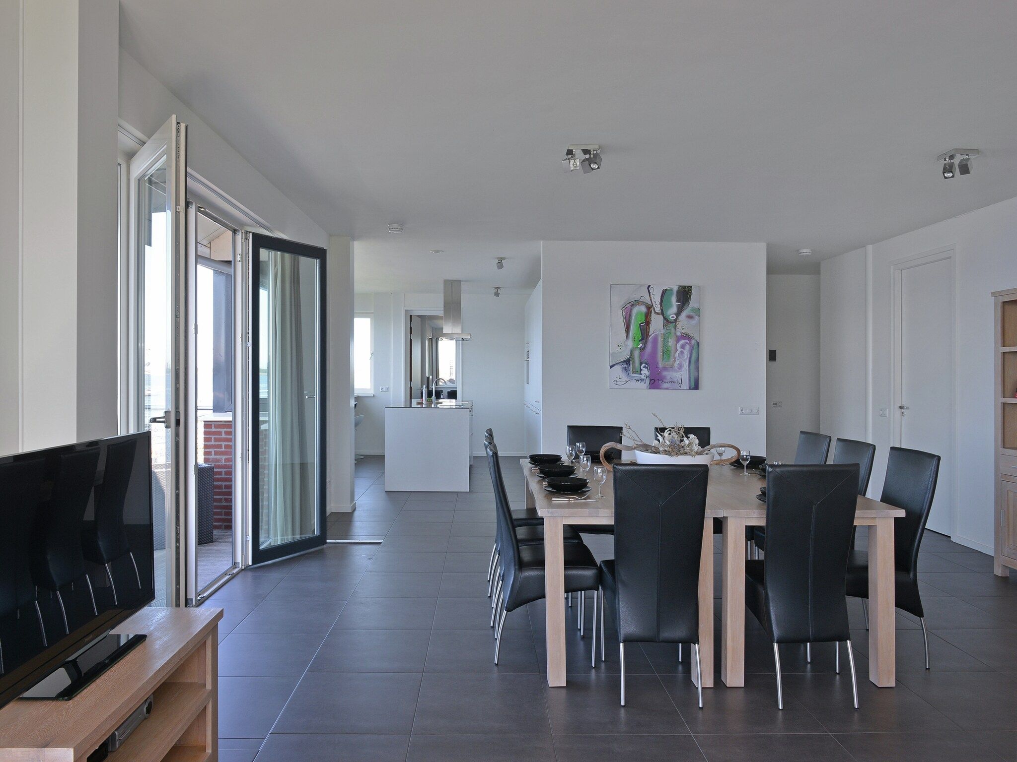 De woonkamer van Penthouse 4a - De Schotsman Watersport in Kamperland