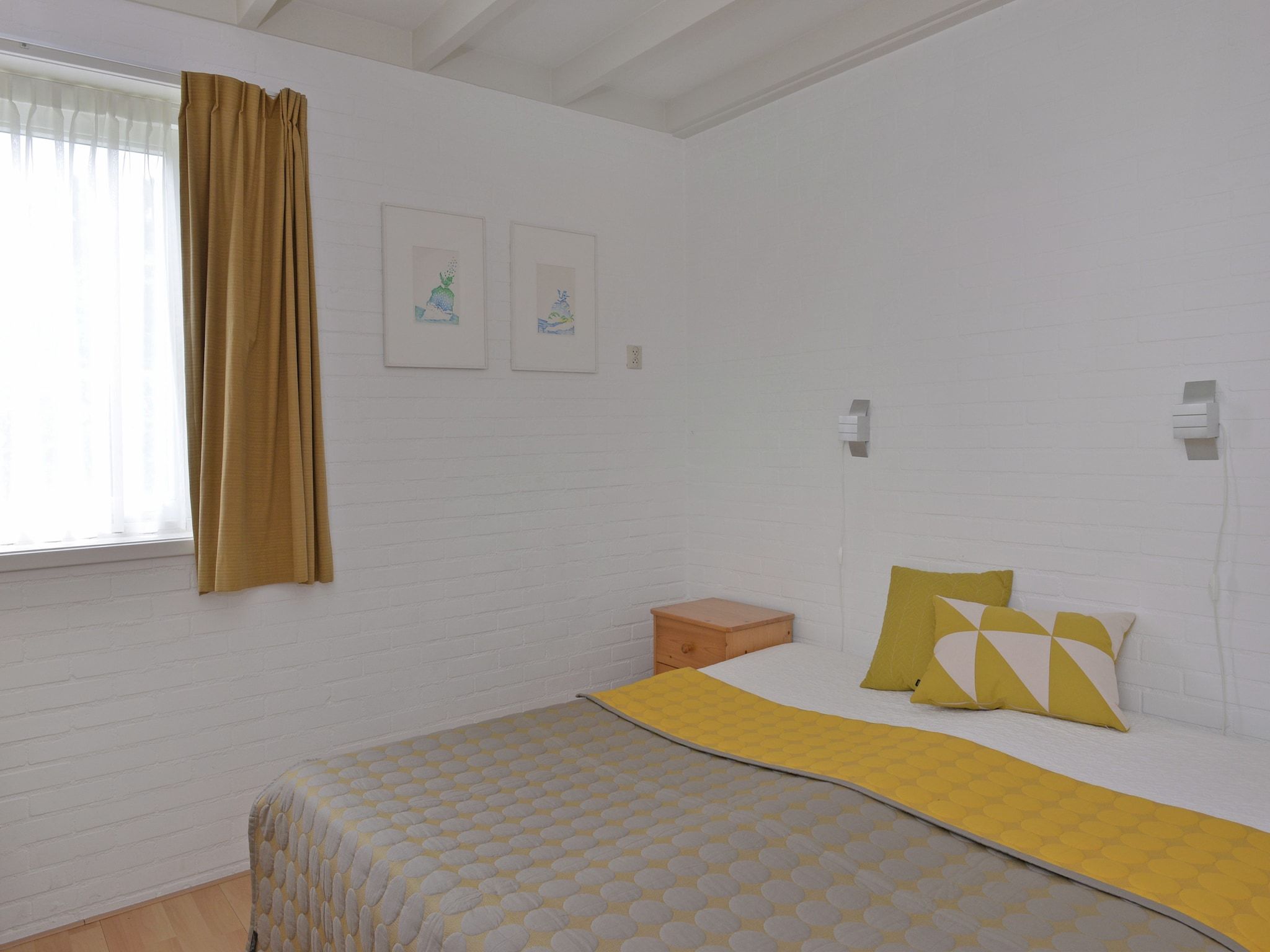 Een slaapkamer van Wilgenlaan 15 in Kamperland