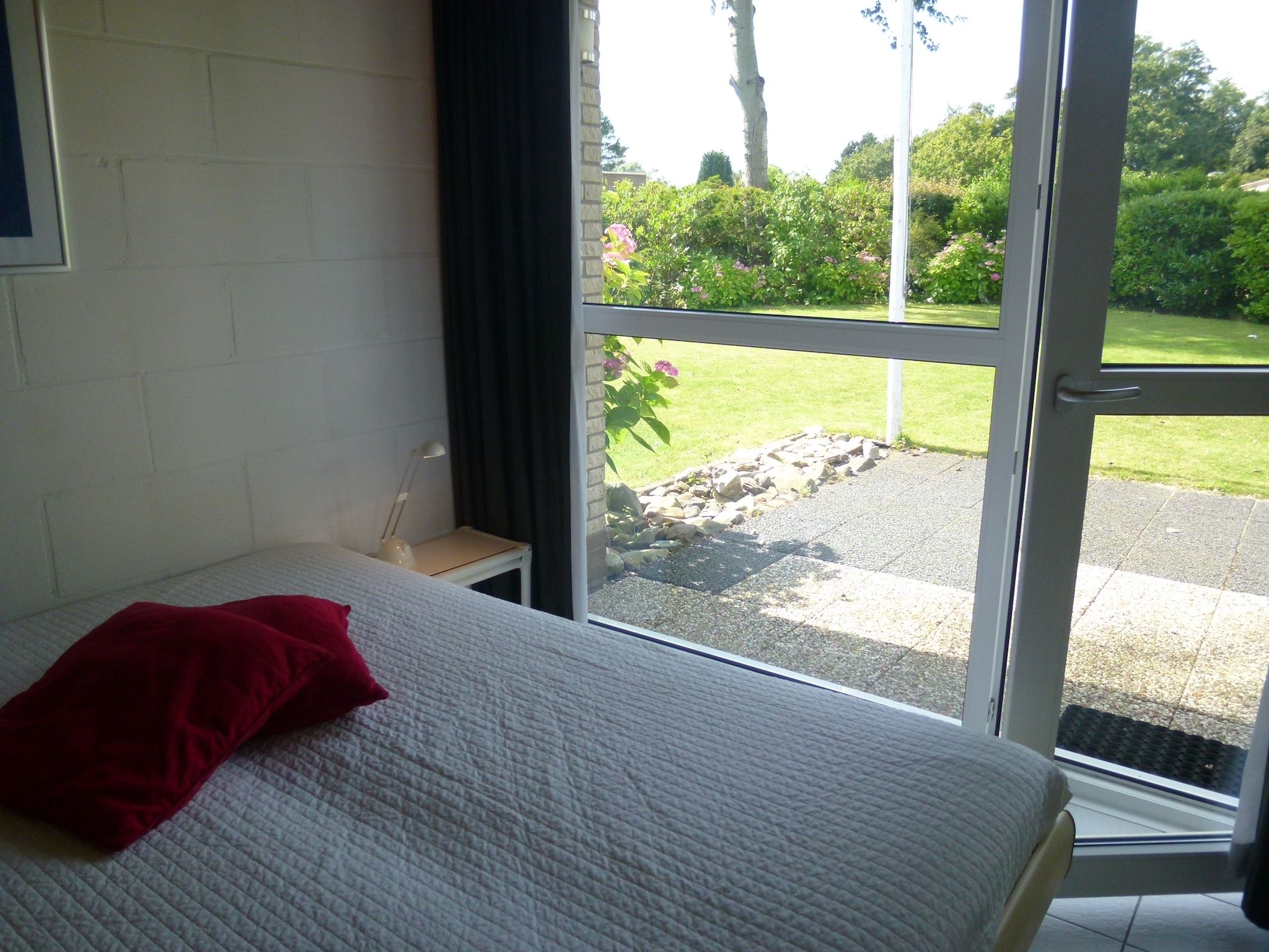 Een slaapkamer van Berkenlaan 6 in Kamperland