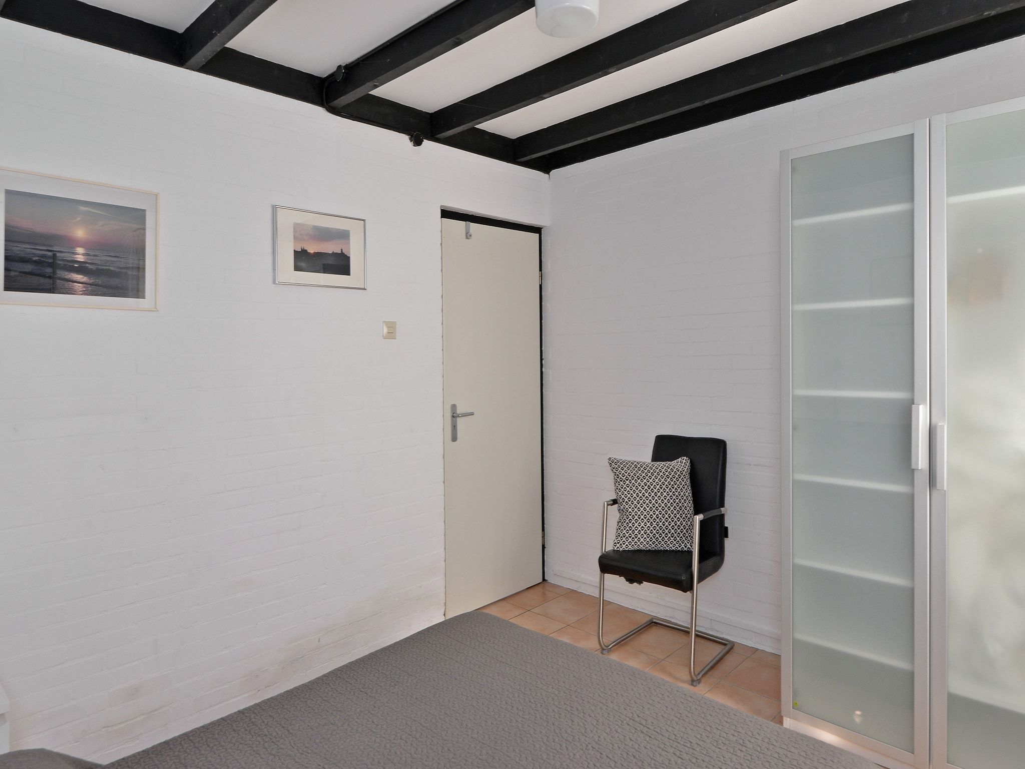 Een slaapkamer van Cederlaan 8 in Kamperland