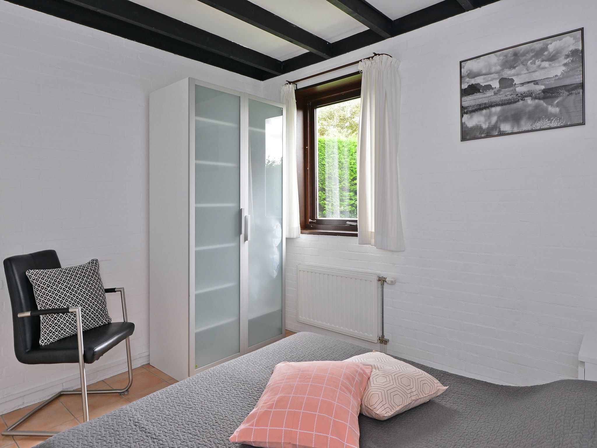 Een slaapkamer van Cederlaan 8 in Kamperland