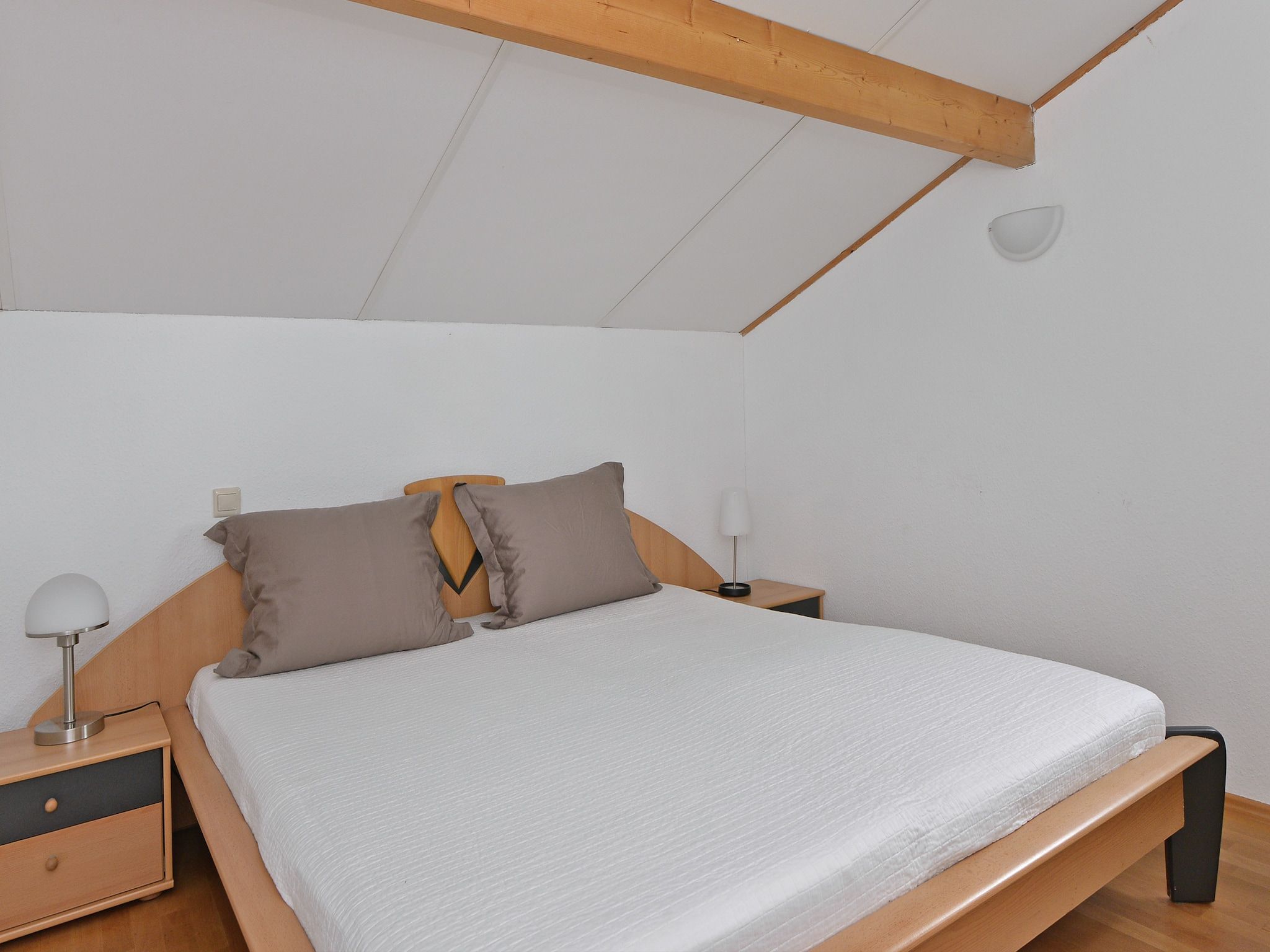 Een slaapkamer van Cederlaan 8 in Kamperland