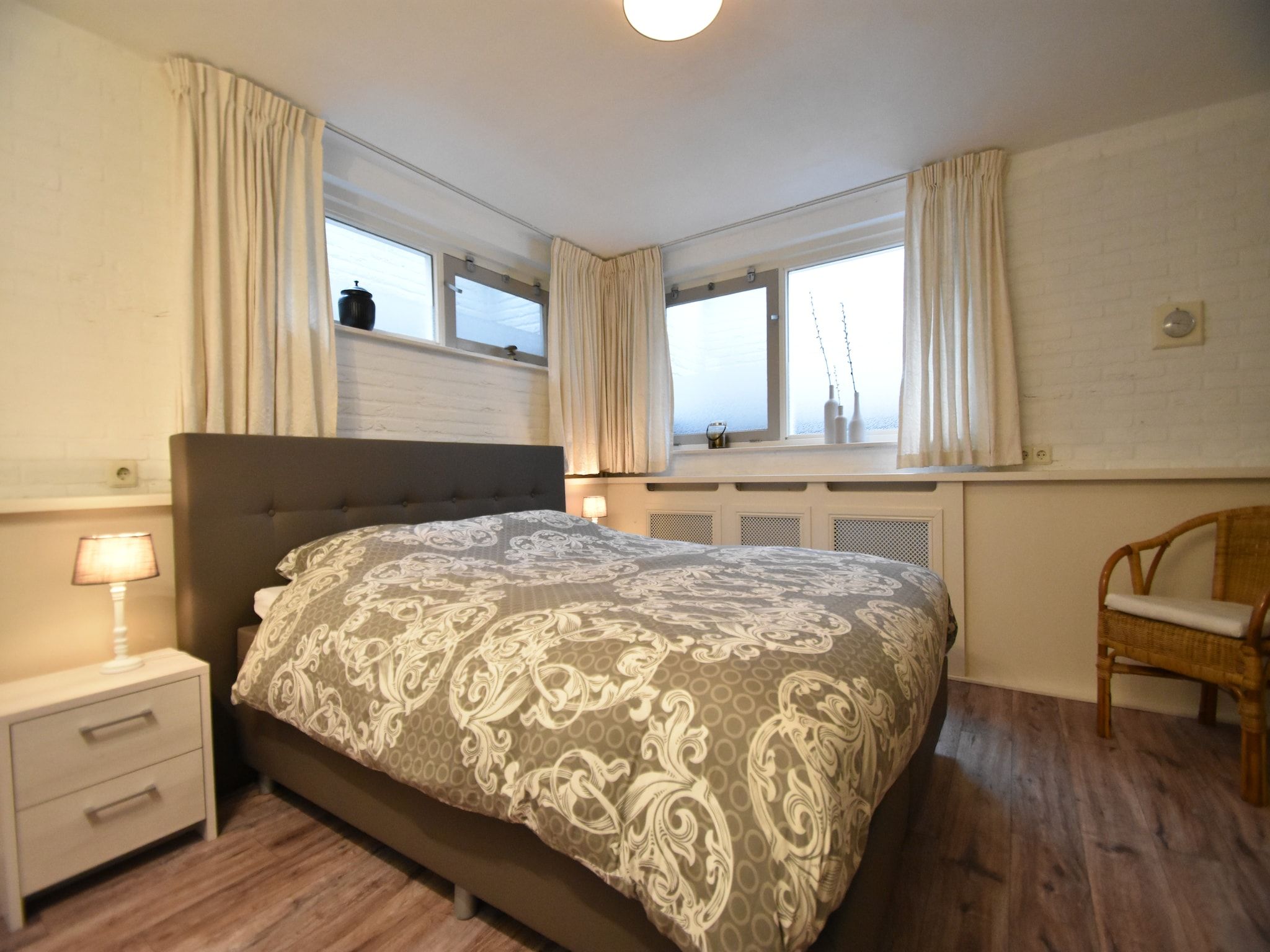 Een slaapkamer van 't Woudhuis in Holten