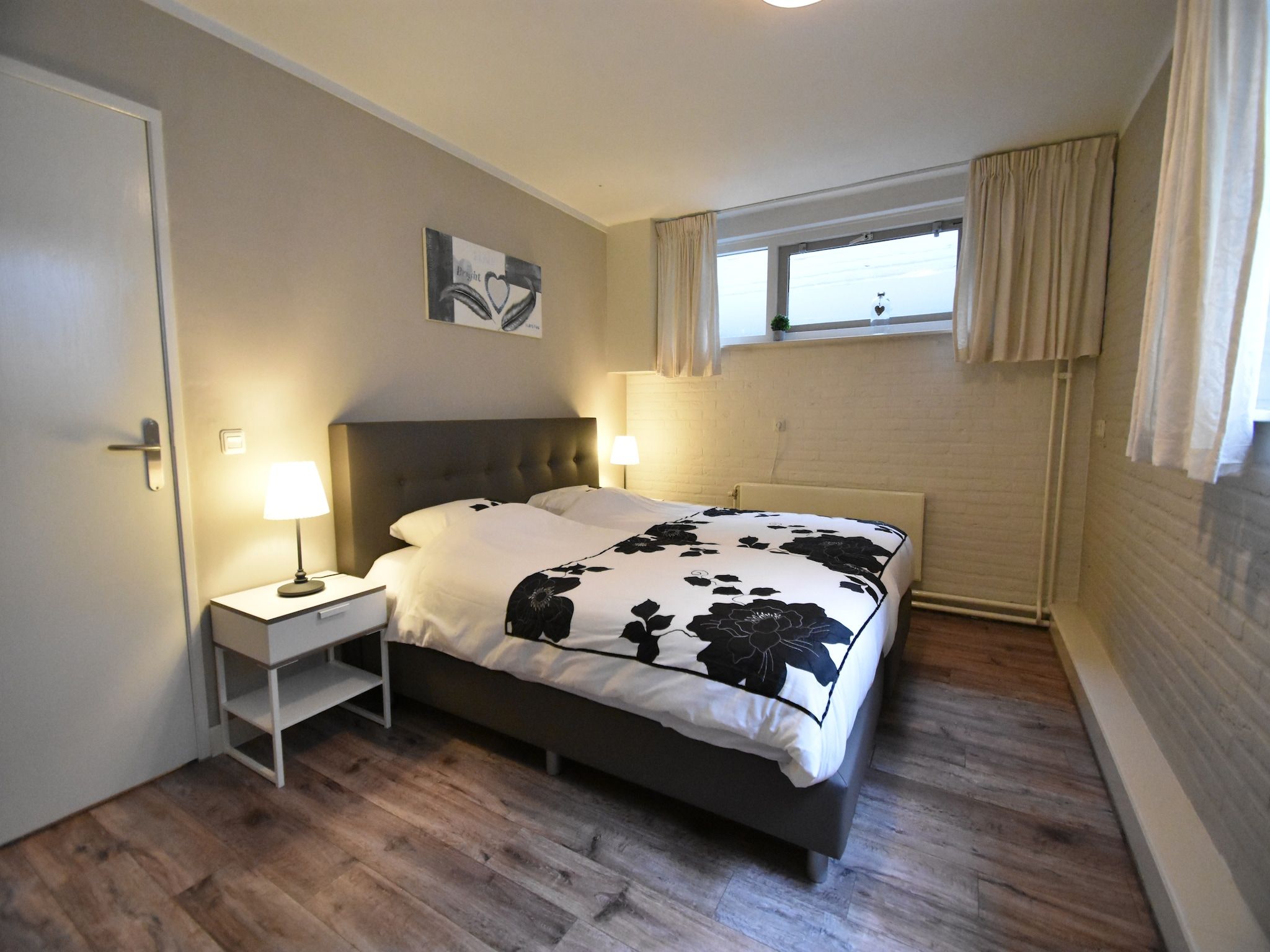 Een slaapkamer van 't Woudhuis in Holten