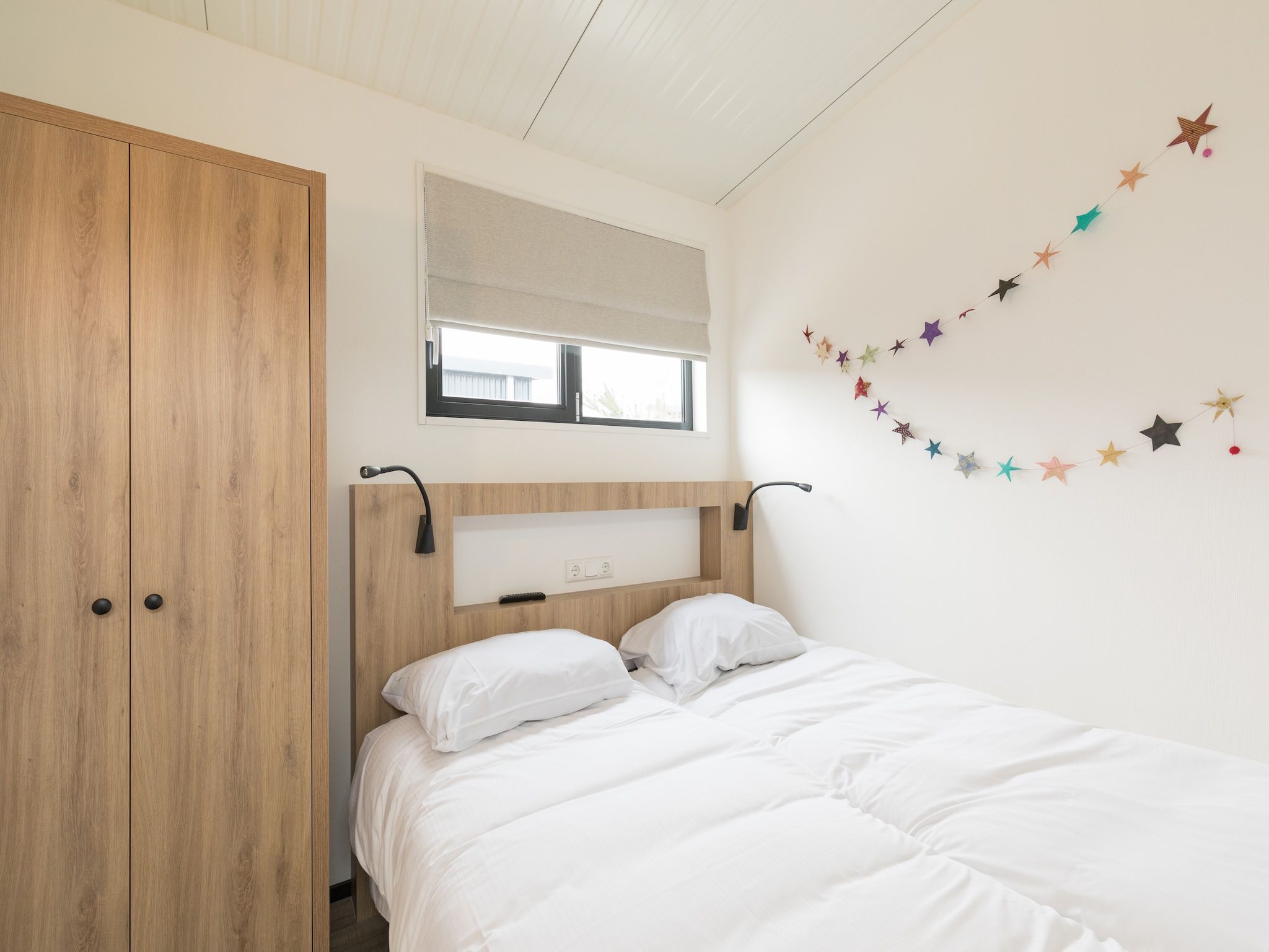 Een slaapkamer van Sea Lodges Ameland 2 in Hollum