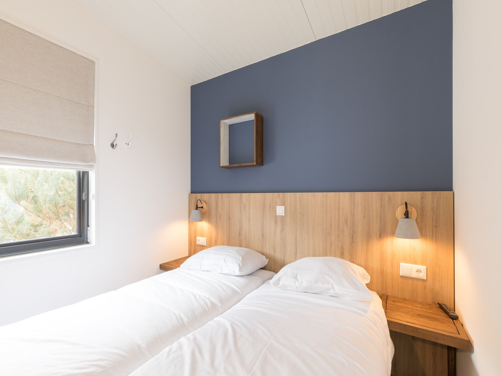 Een slaapkamer van Sea Lodges Ameland 2 in Hollum