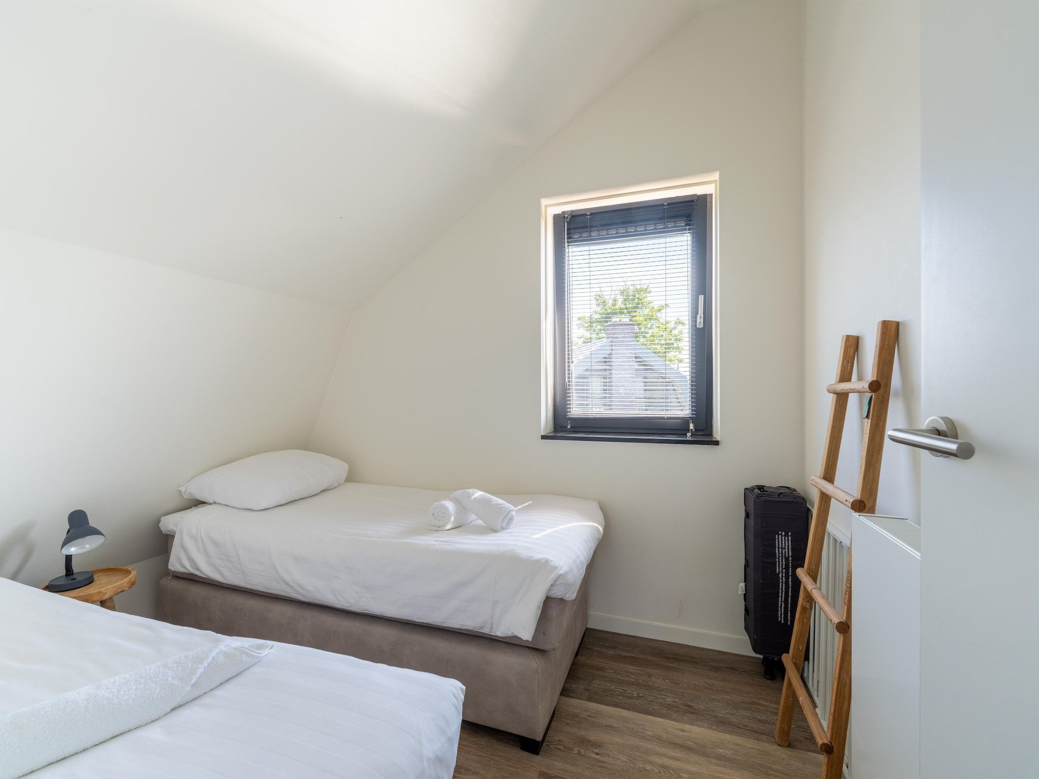 Een slaapkamer van Waterland in Egmond aan den Hoef