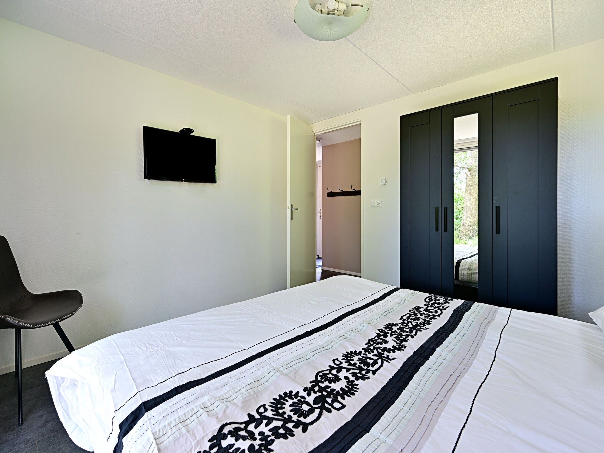 Een slaapkamer van Zijzicht in Reutum-Weerselo