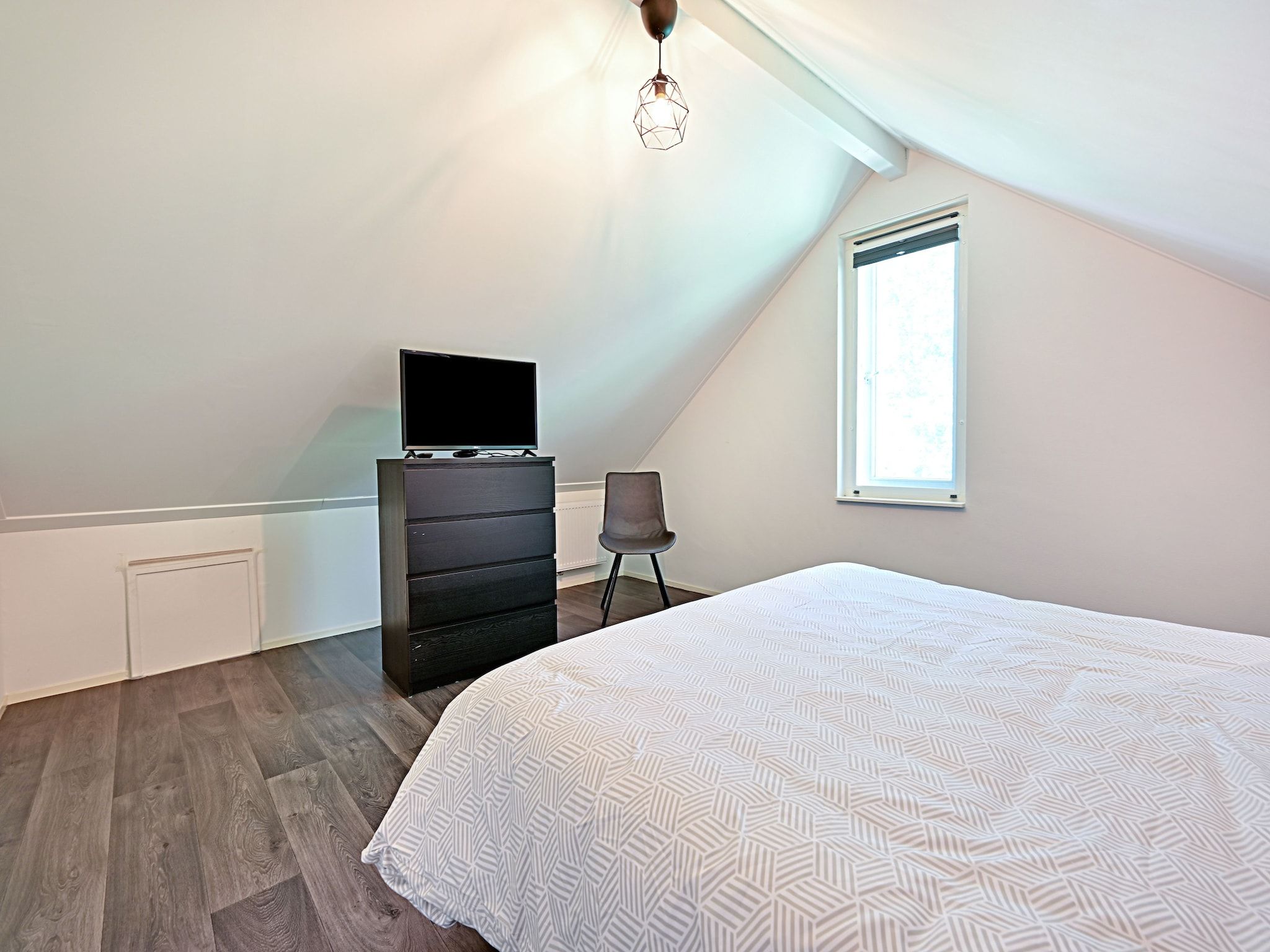 Een slaapkamer van Zijzicht in Reutum-Weerselo