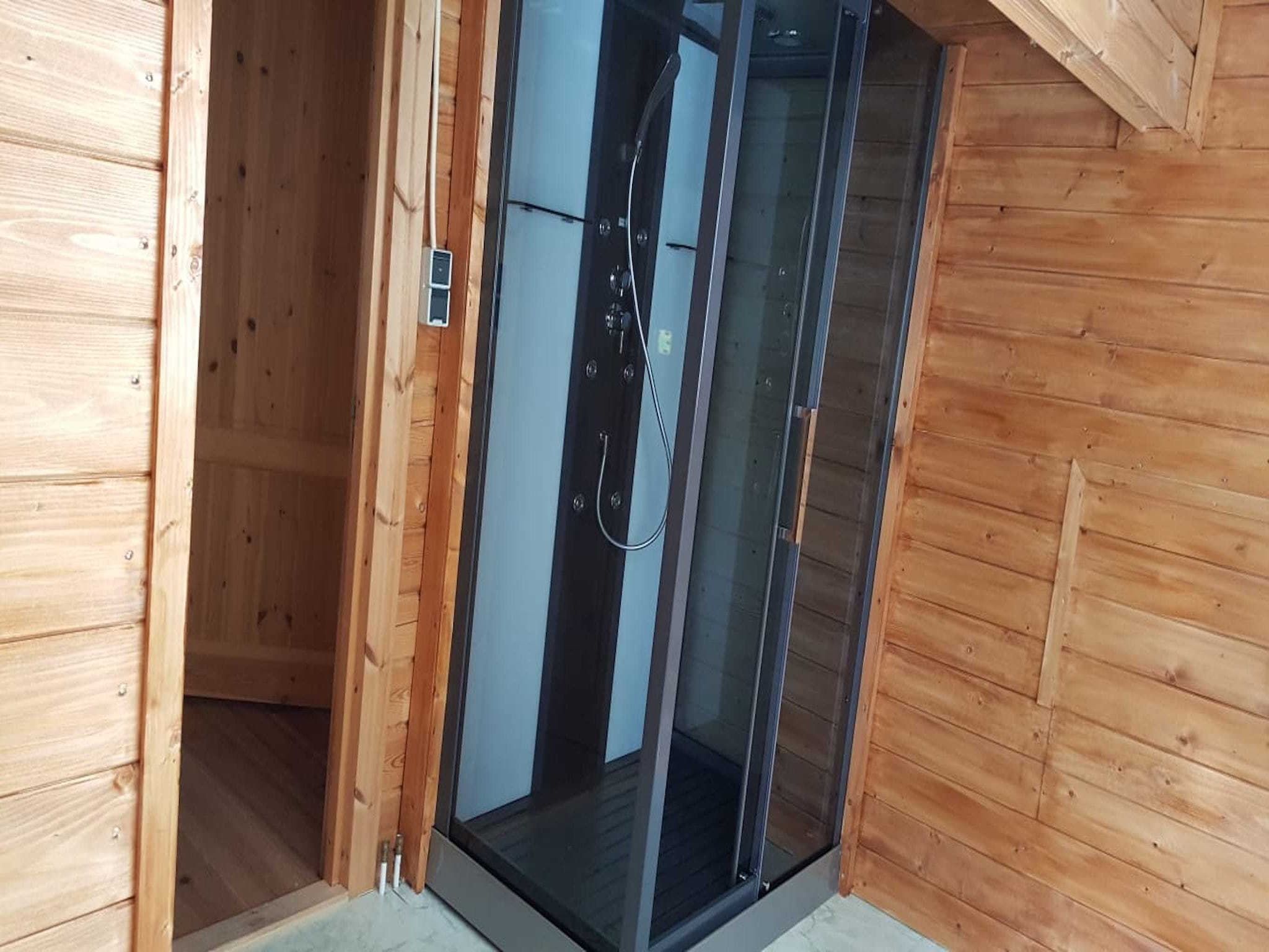 De badkamer van Vakantiepark De Rimboe & De Woeste Hoogte 1 in Hoenderloo