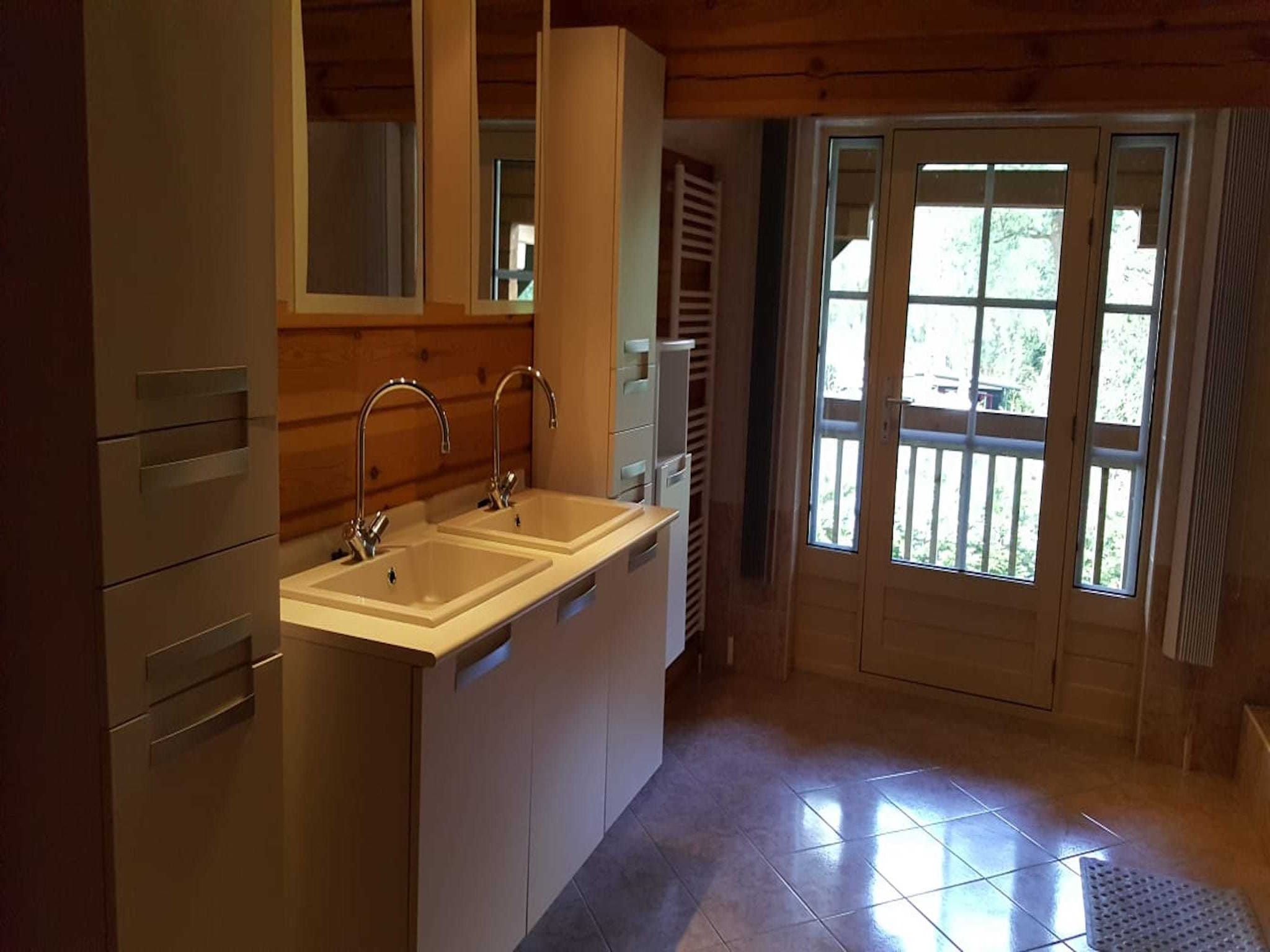 De badkamer van Vakantiepark De Rimboe & De Woeste Hoogte 1 in Hoenderloo