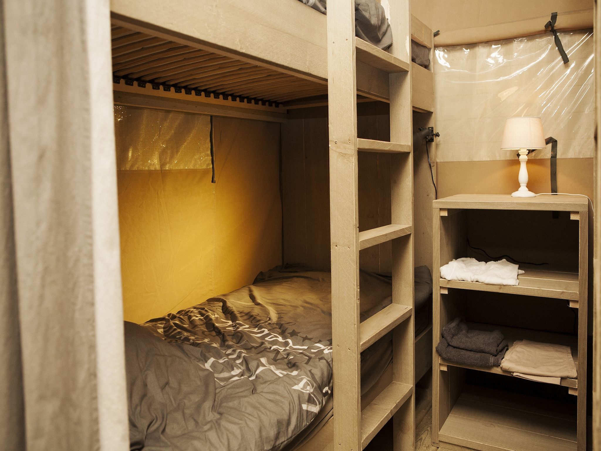 Een slaapkamer van Recreatiepark de Boshoek 2 in Voorthuizen