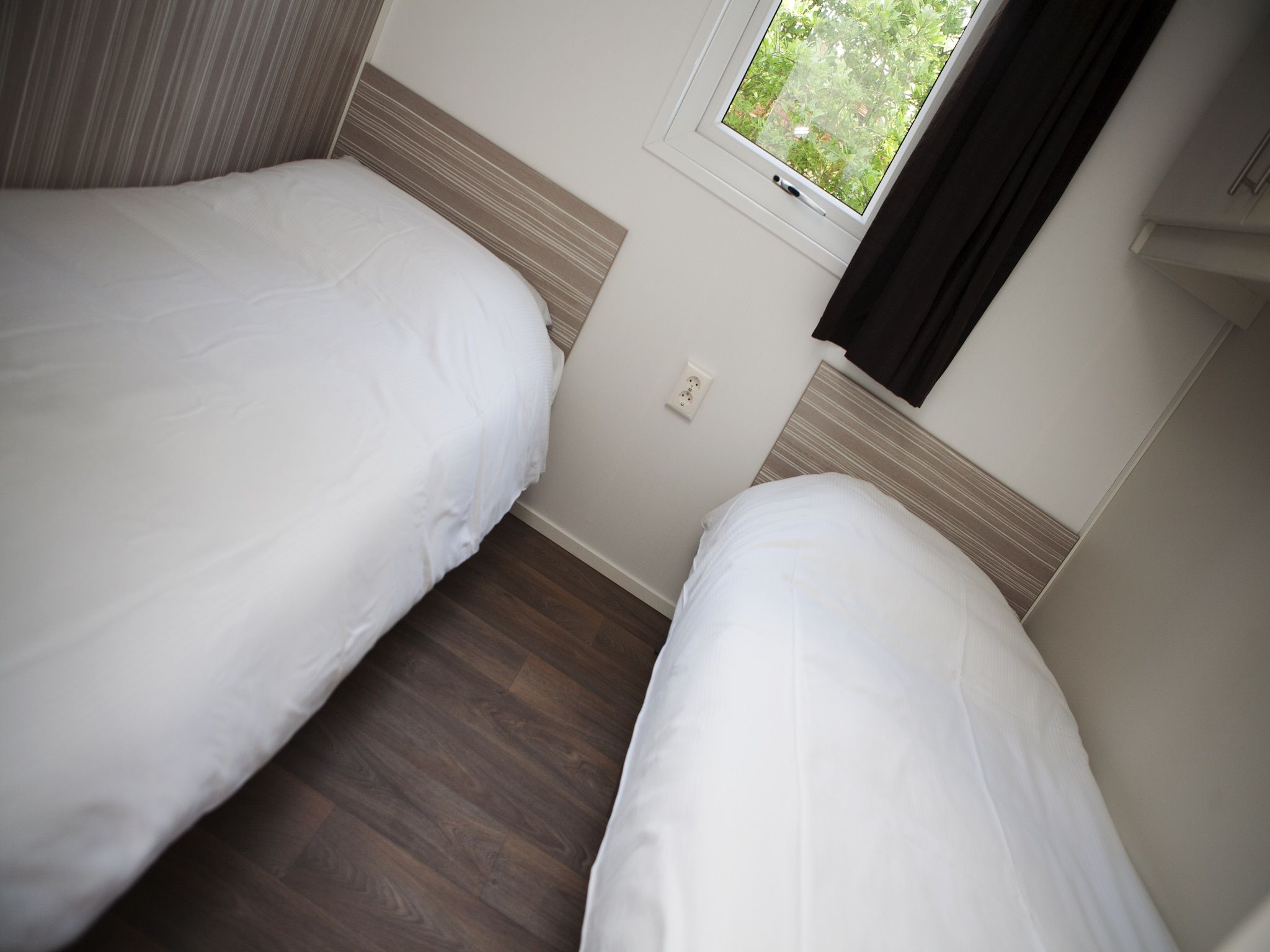 Een slaapkamer van Recreatiepark de Boshoek 5 in Voorthuizen