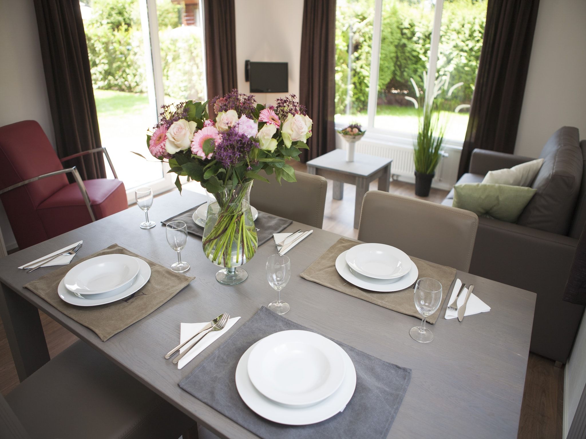 De woonkamer van Recreatiepark de Boshoek 5 in Voorthuizen