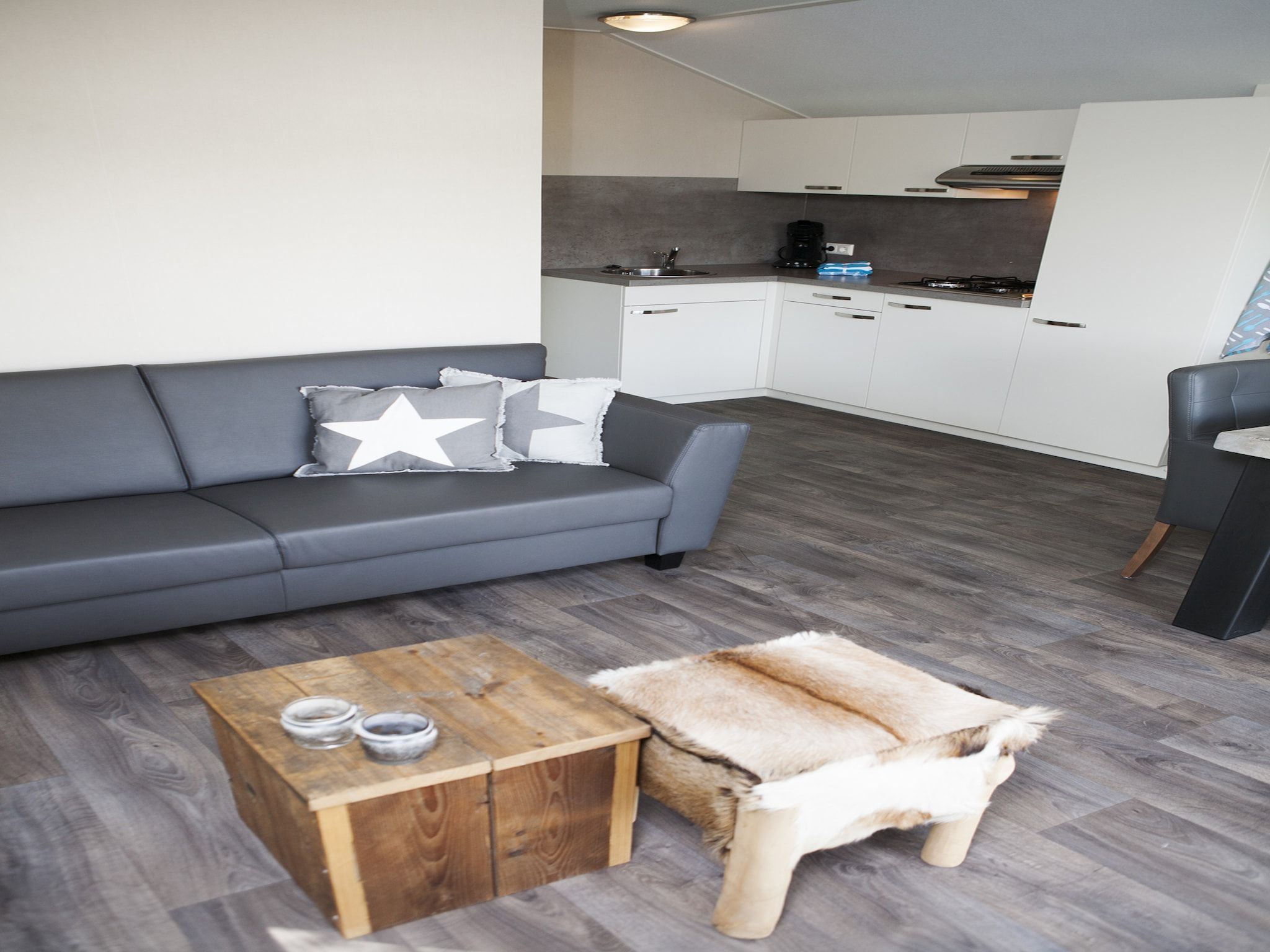 De woonkamer van Recreatiepark de Boshoek 6 in Voorthuizen