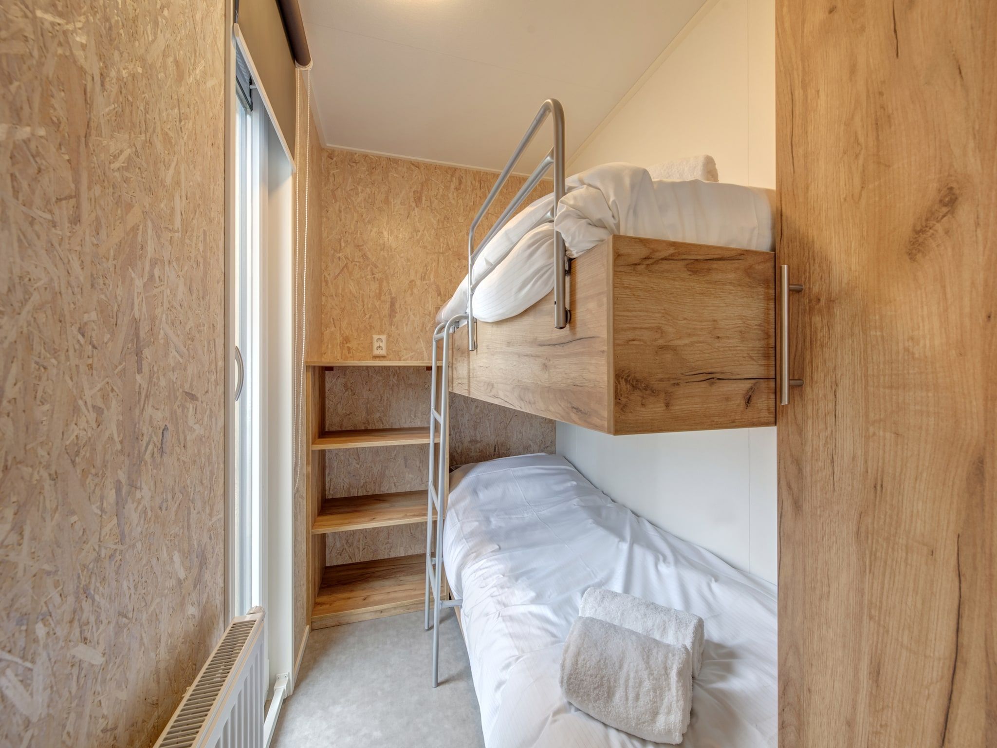 Een slaapkamer van Vakantiepark Kijkduin 1 in Den Haag