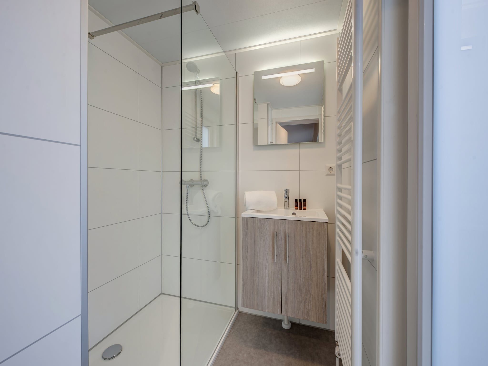 De badkamer van Vakantiepark Kijkduin 1 in Den Haag