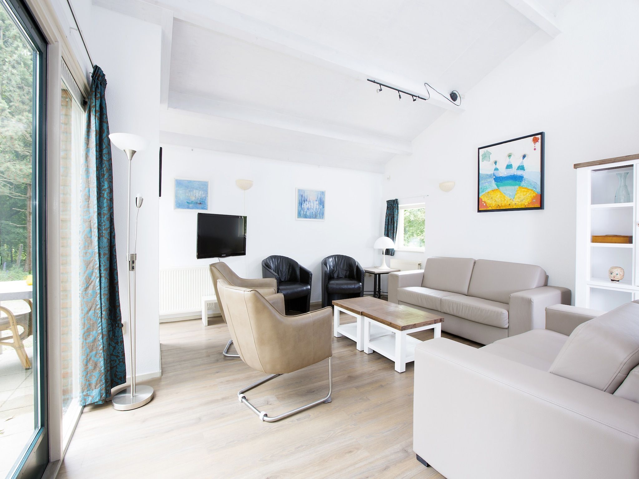 De woonkamer van Vakantiepark Kijkduin 7 in Den Haag