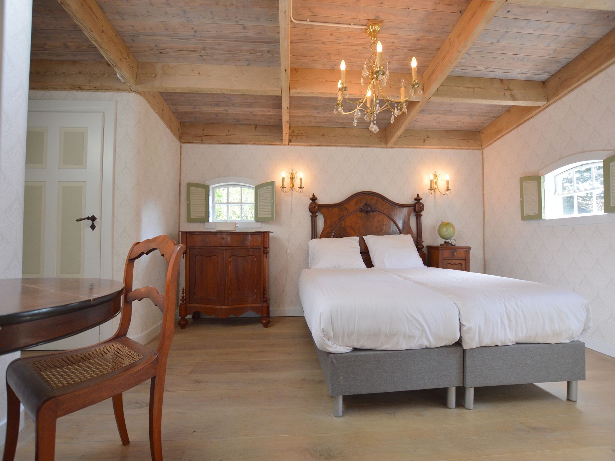 Een slaapkamer van Guesthouse The Old Cottage in Volkel