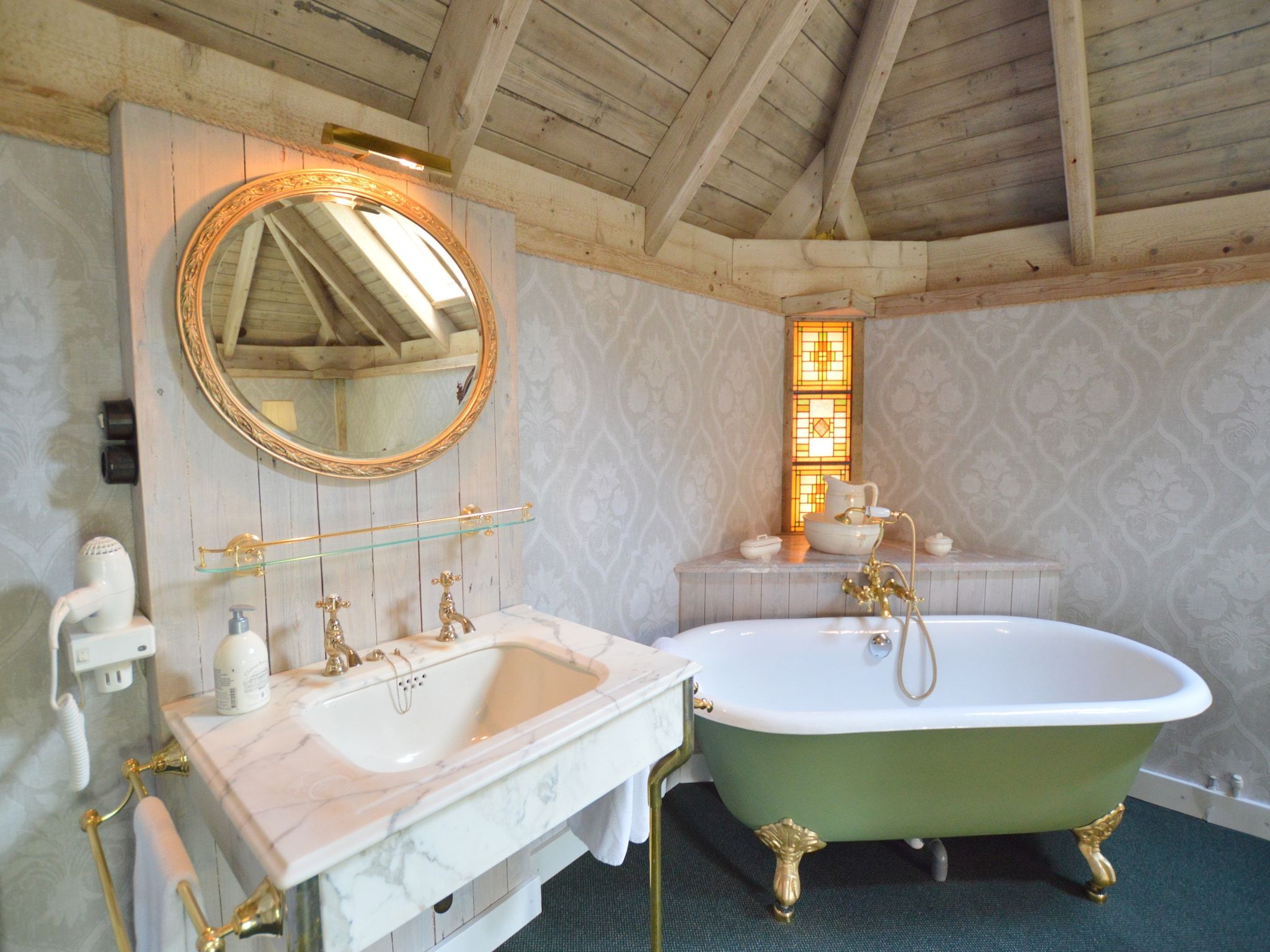 De badkamer van Guesthouse The Old Cottage in Volkel