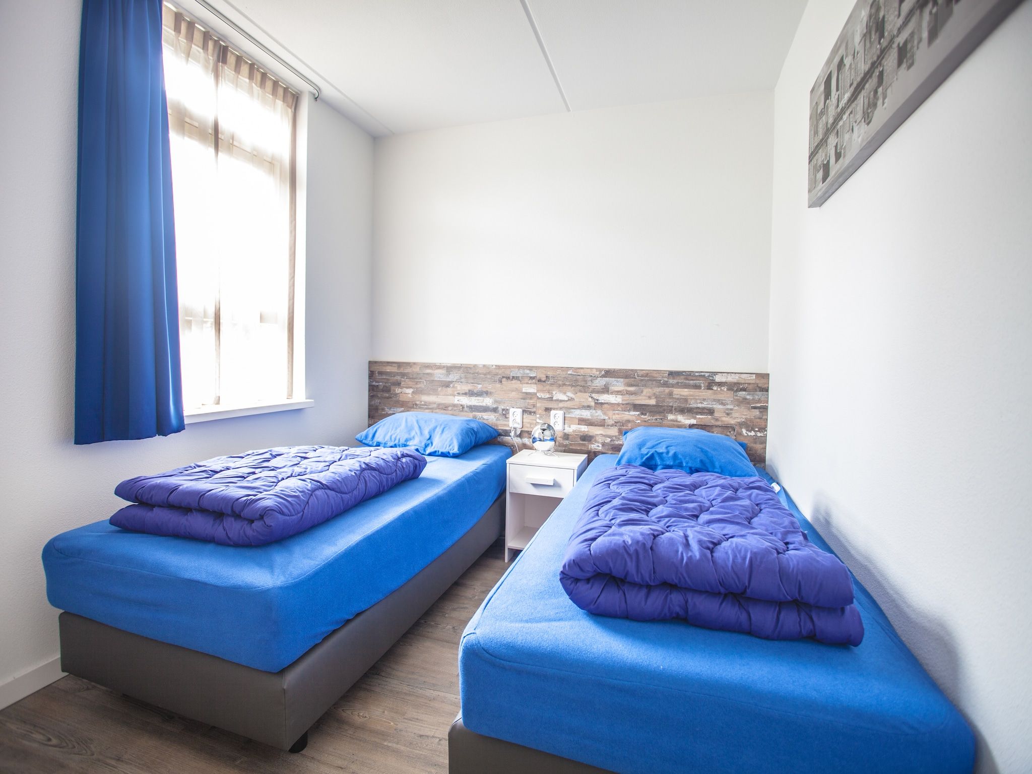 Een slaapkamer van Oosterdijk 6 in Medemblik