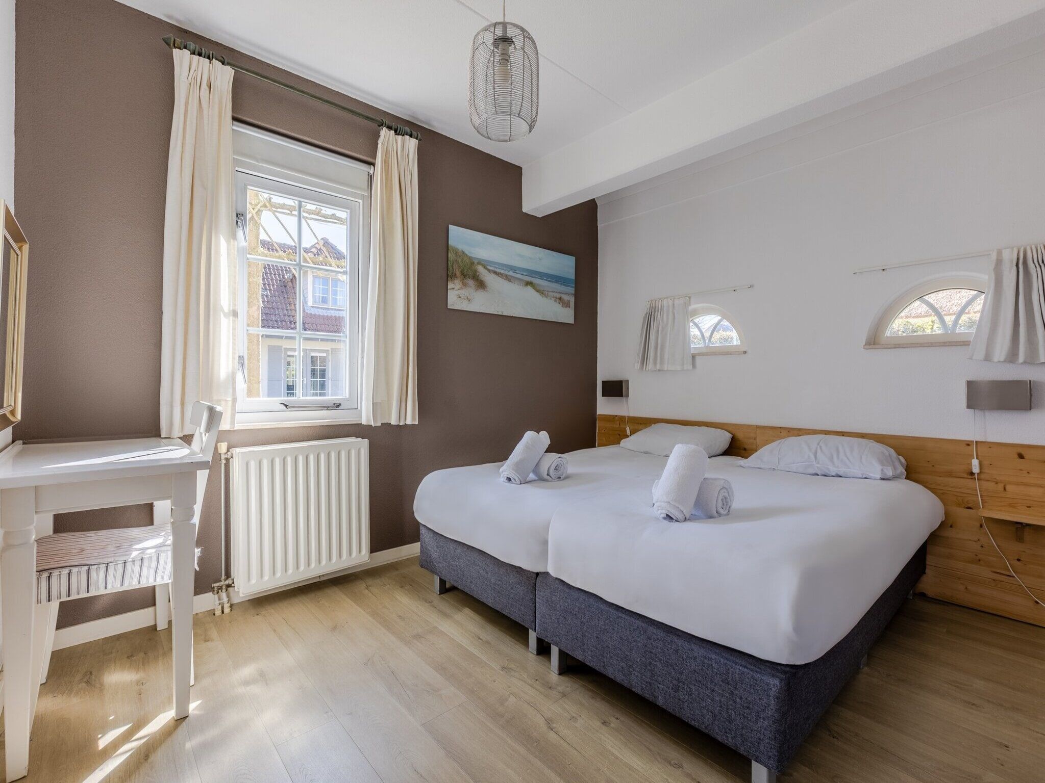 Een slaapkamer van Buitenhof Domburg 12 in Domburg