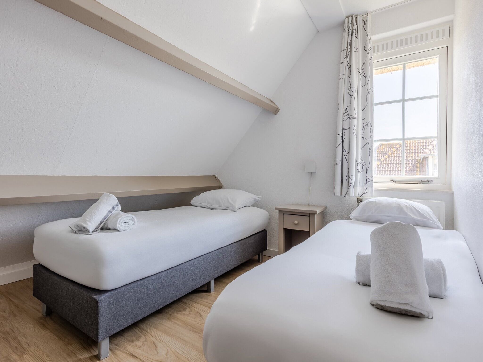 Een slaapkamer van Buitenhof Domburg 12 in Domburg