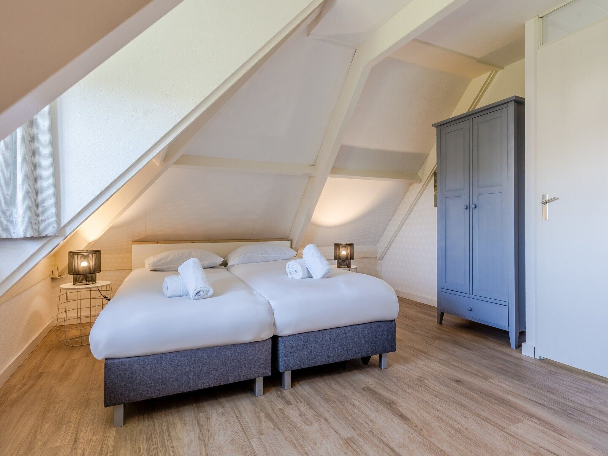 Een slaapkamer van Buitenhof Domburg 12 in Domburg