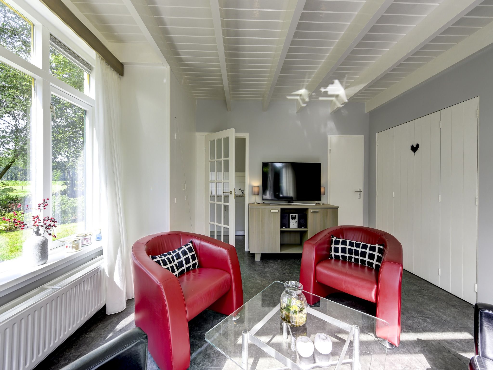 De woonkamer van Buitenplaats Gerner 6 in Dalfsen