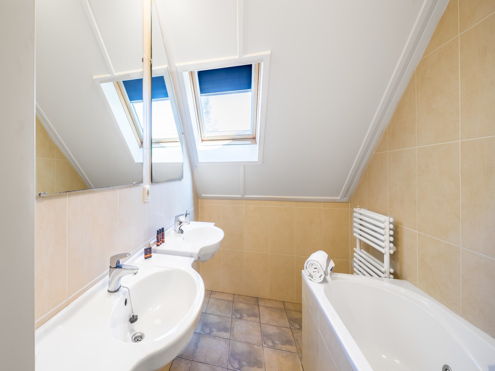 De badkamer van Vakantiepark Weerterbergen 7 in Weert