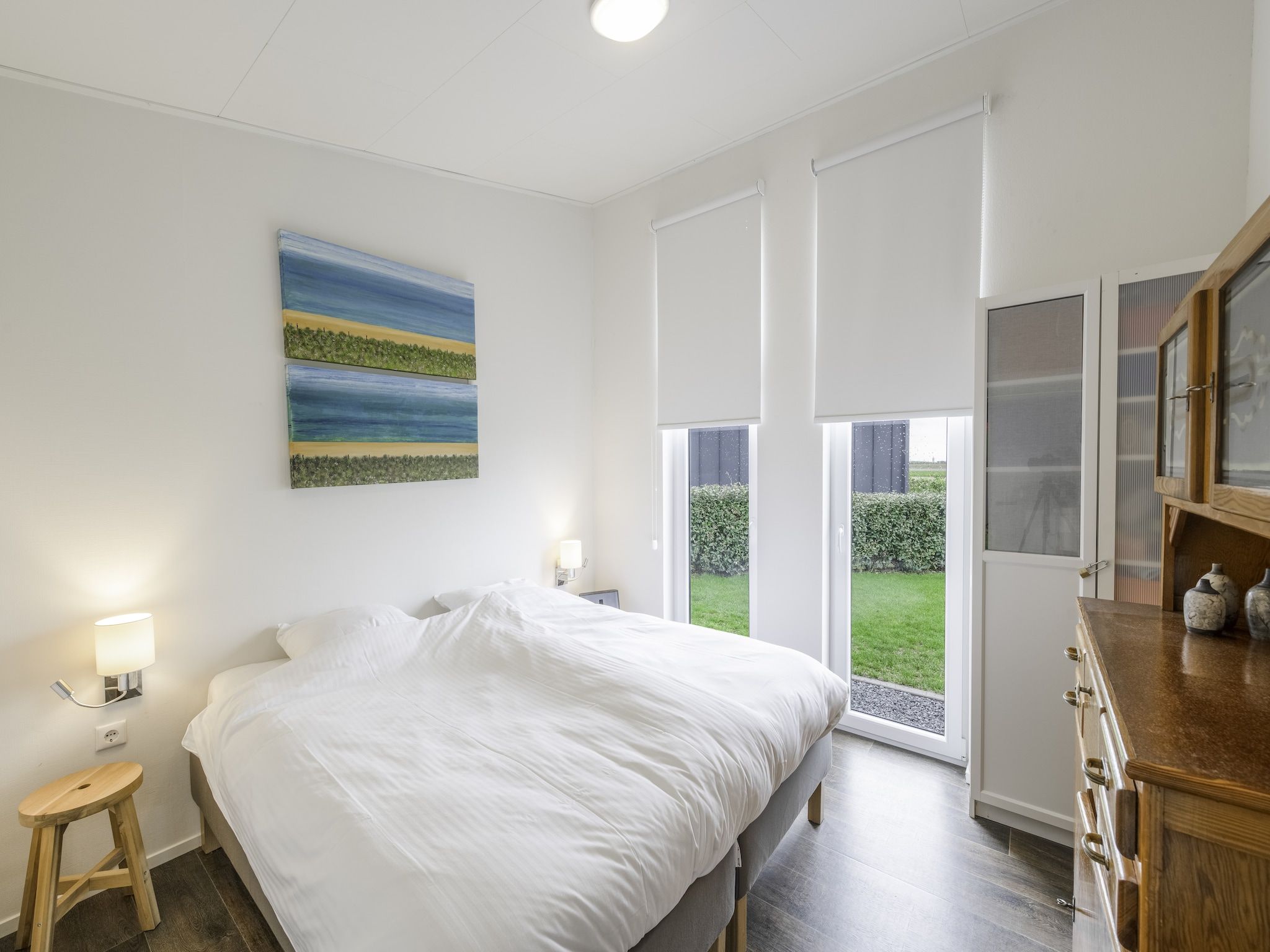 Een slaapkamer van Water Resort Oosterschelde 51 in Wemeldinge