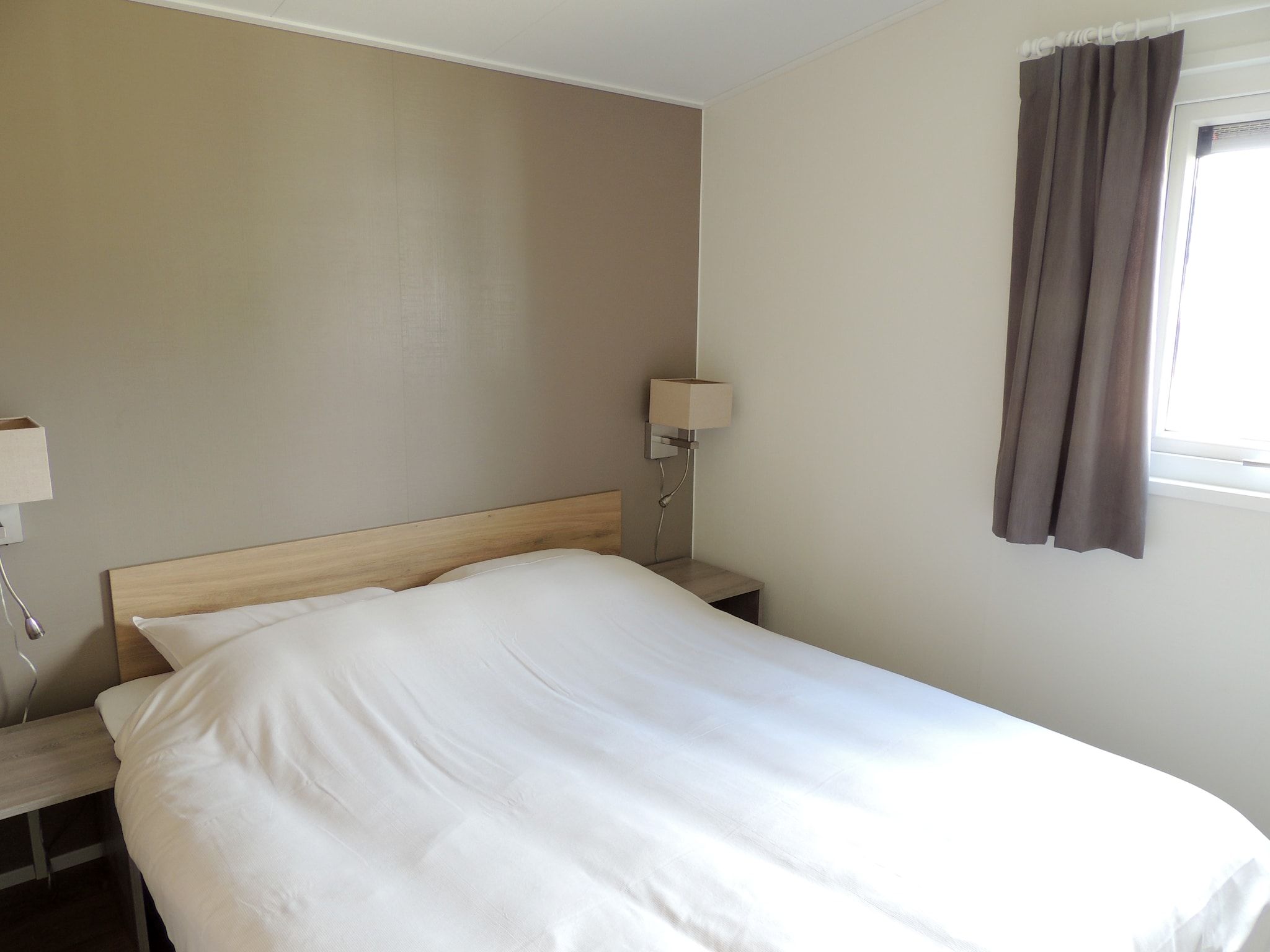 Een slaapkamer van Recreatiepark de Boshoek 20 in Voorthuizen