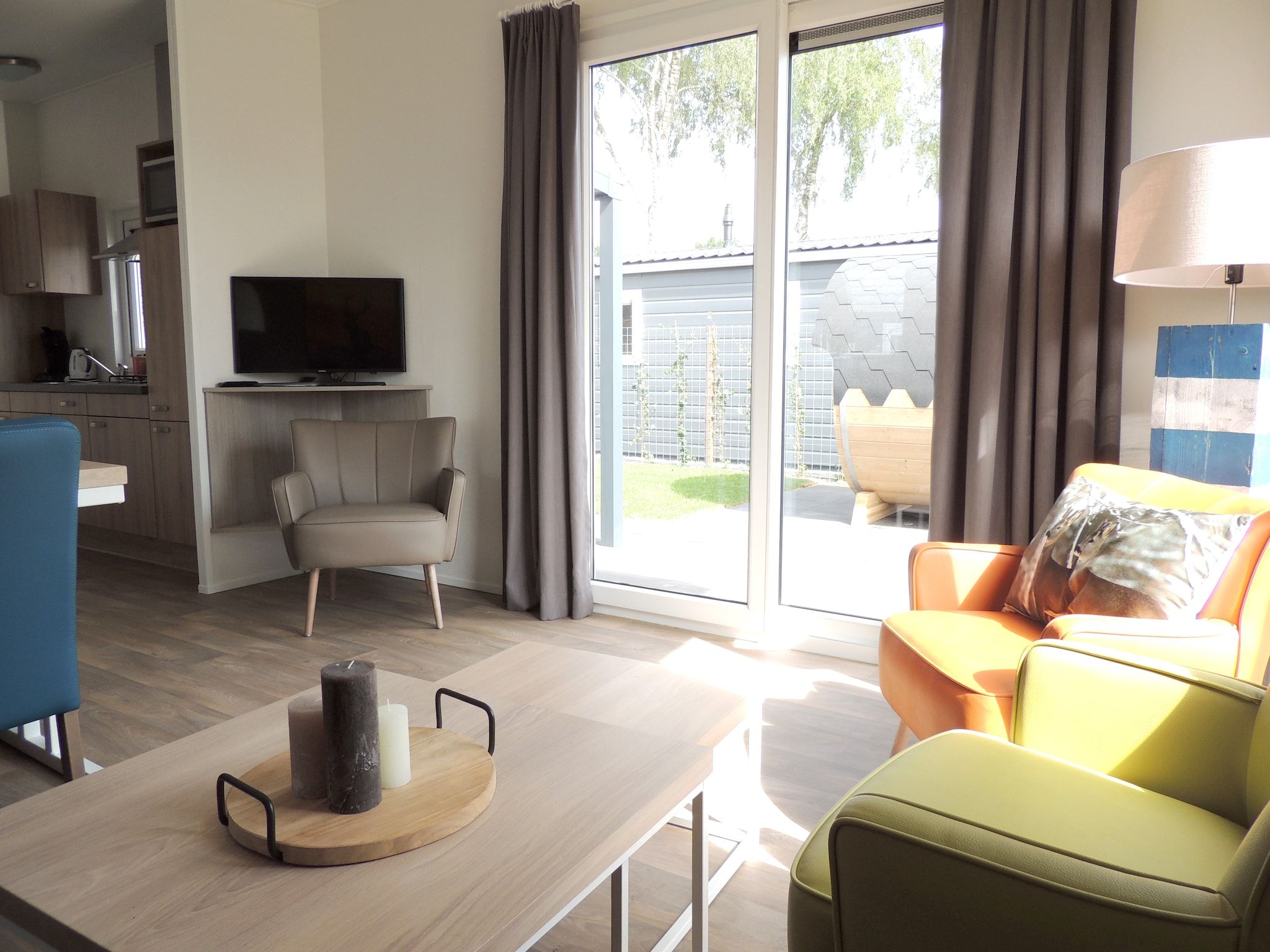 De woonkamer van Recreatiepark de Boshoek 20 in Voorthuizen