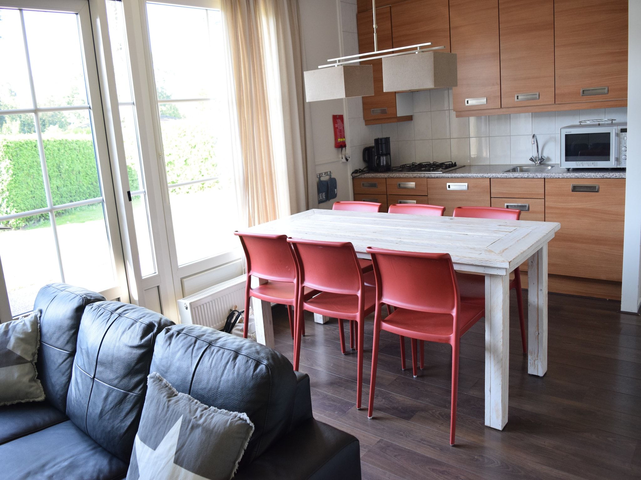 De woonkamer van Recreatiepark de Boshoek 11 in Voorthuizen