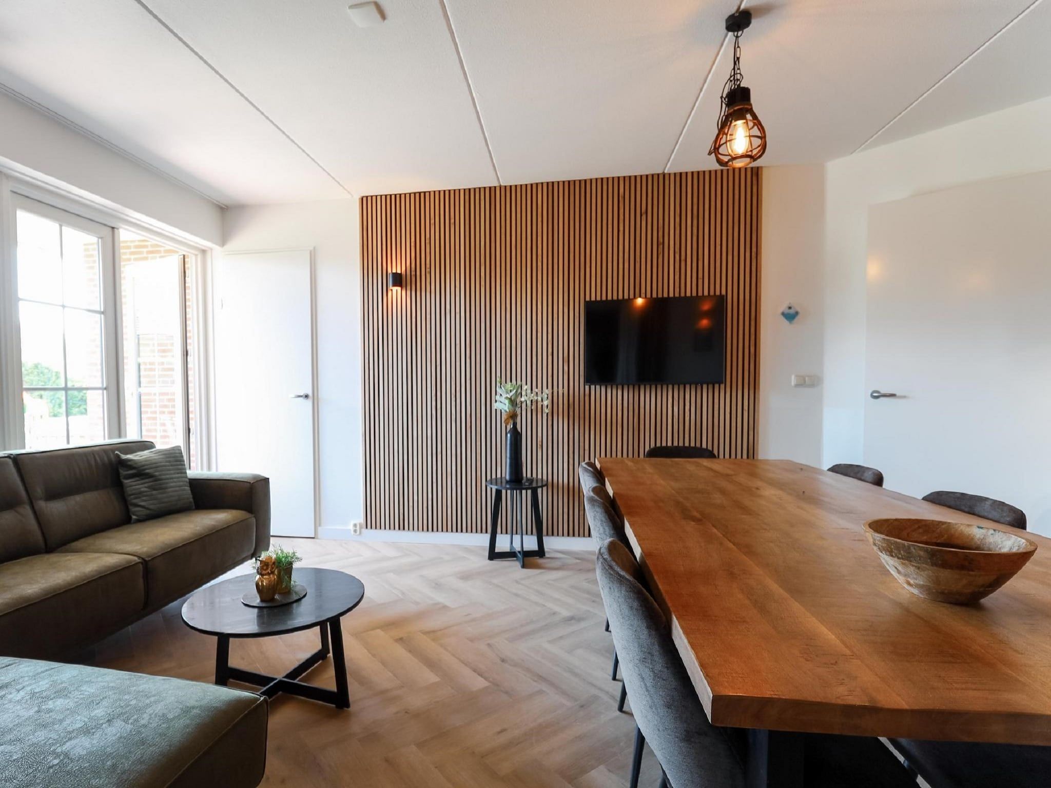 De woonkamer van Recreatiepark de Boshoek 14 in Voorthuizen