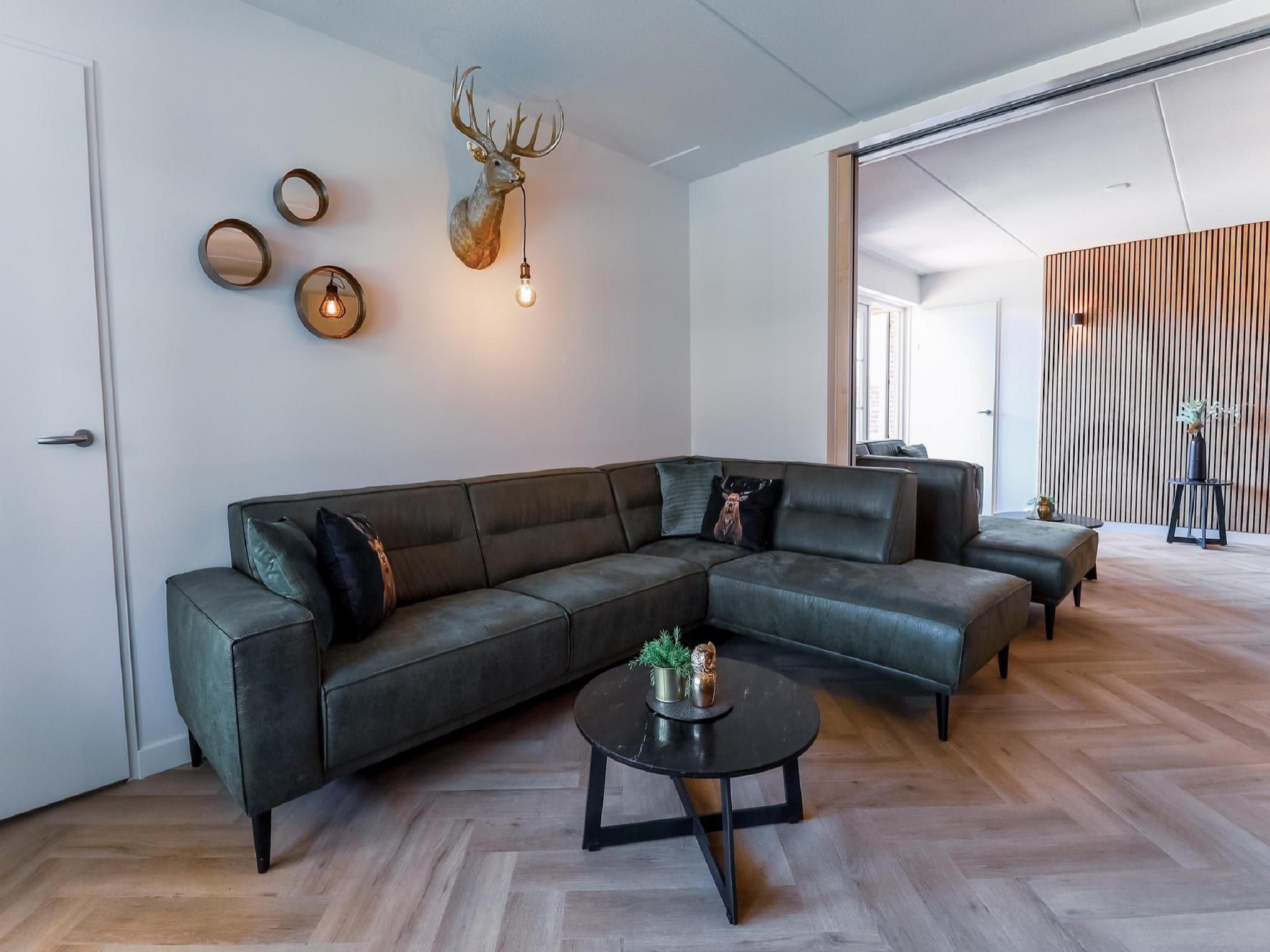 De woonkamer van Recreatiepark de Boshoek 14 in Voorthuizen