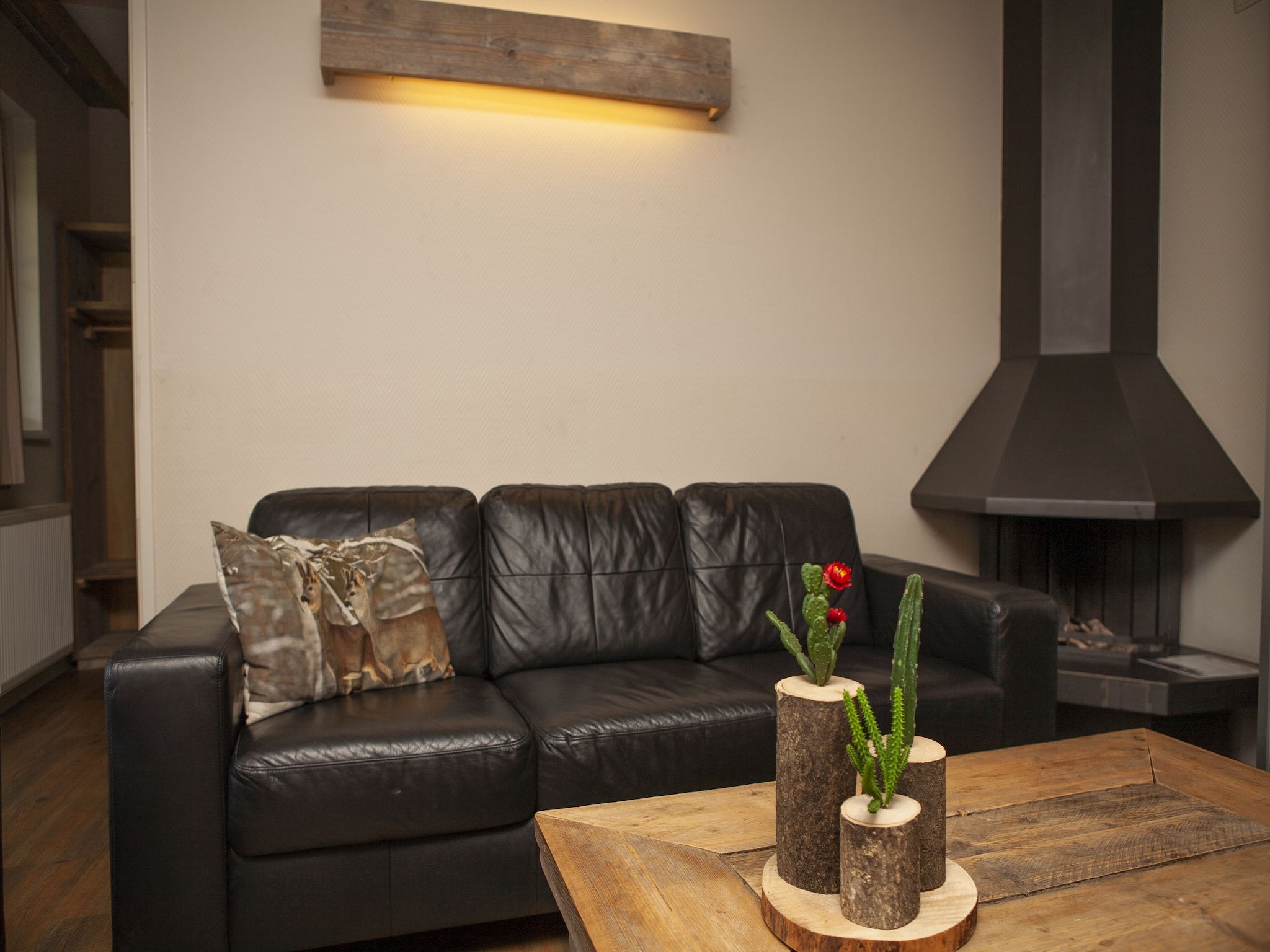 De woonkamer van Recreatiepark de Boshoek 15 in Voorthuizen