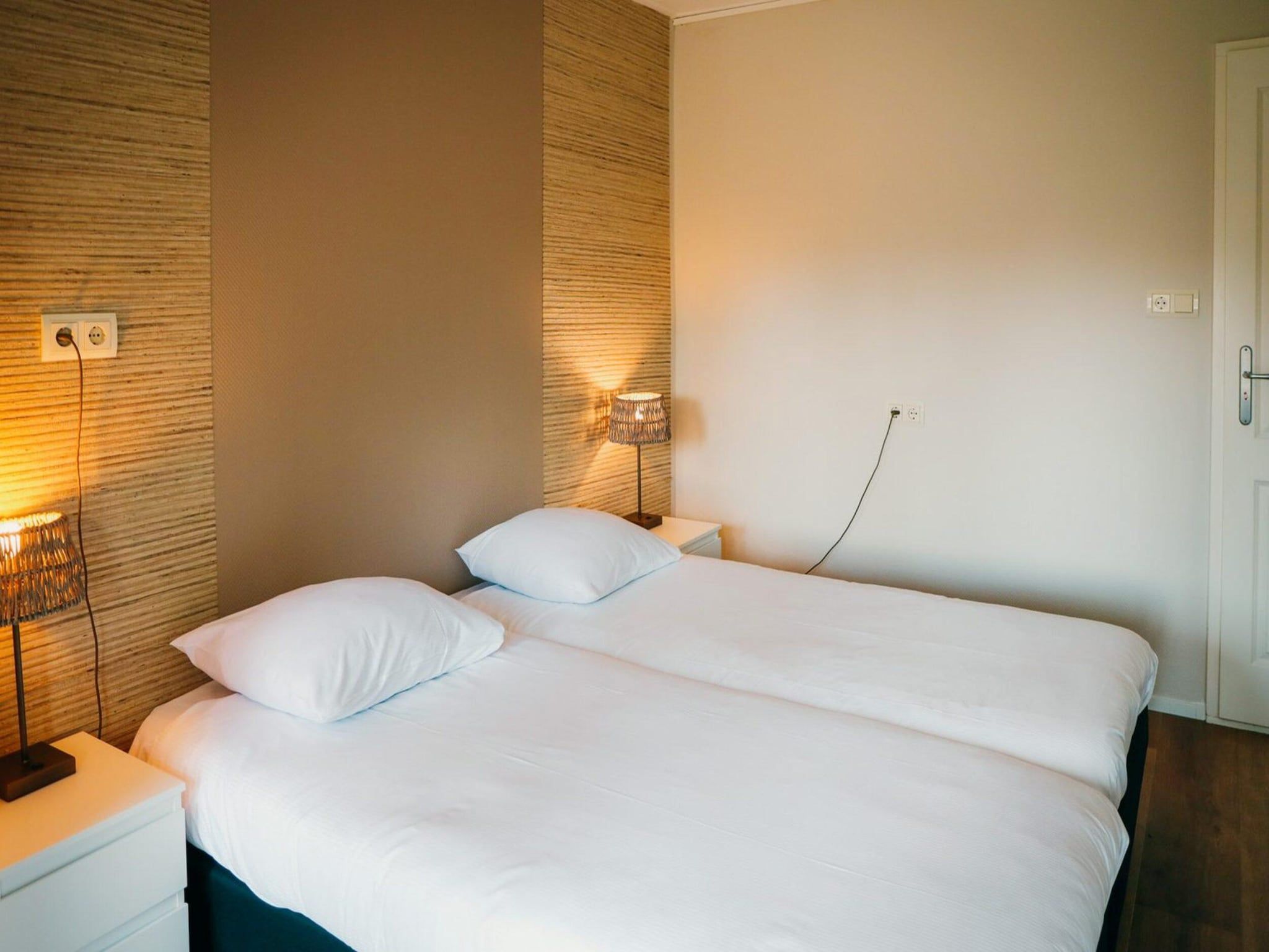 Een slaapkamer van Recreatiepark de Boshoek 16 in Voorthuizen