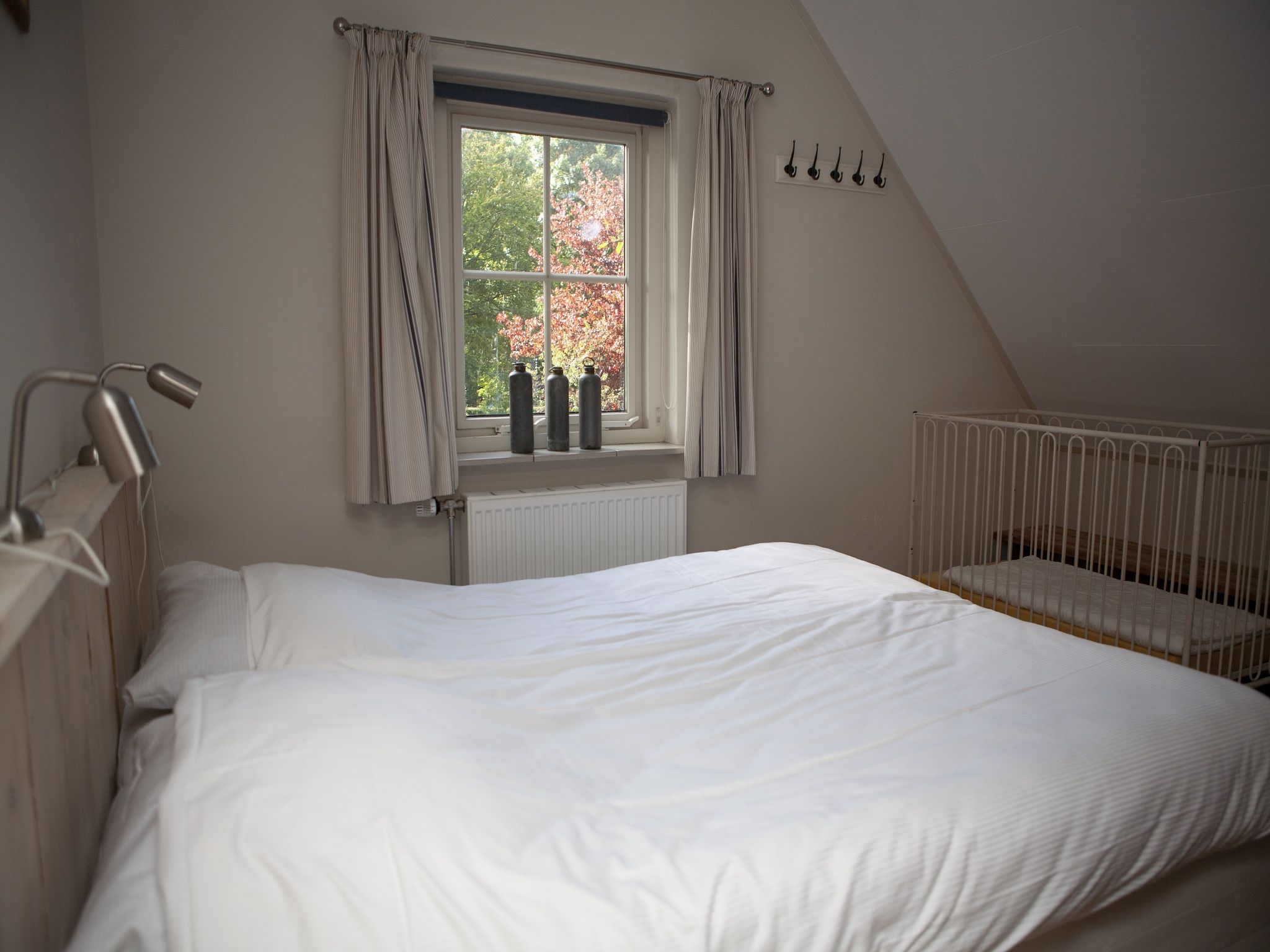 Een slaapkamer van Recreatiepark de Boshoek 17 in Voorthuizen