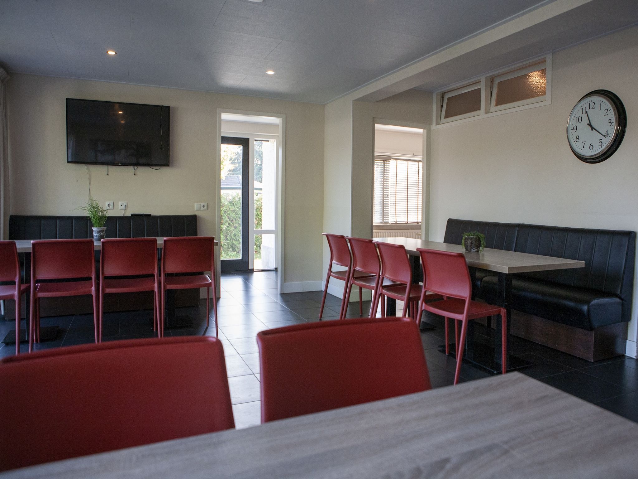 De eetkamer van Recreatiepark de Boshoek 18 in Voorthuizen