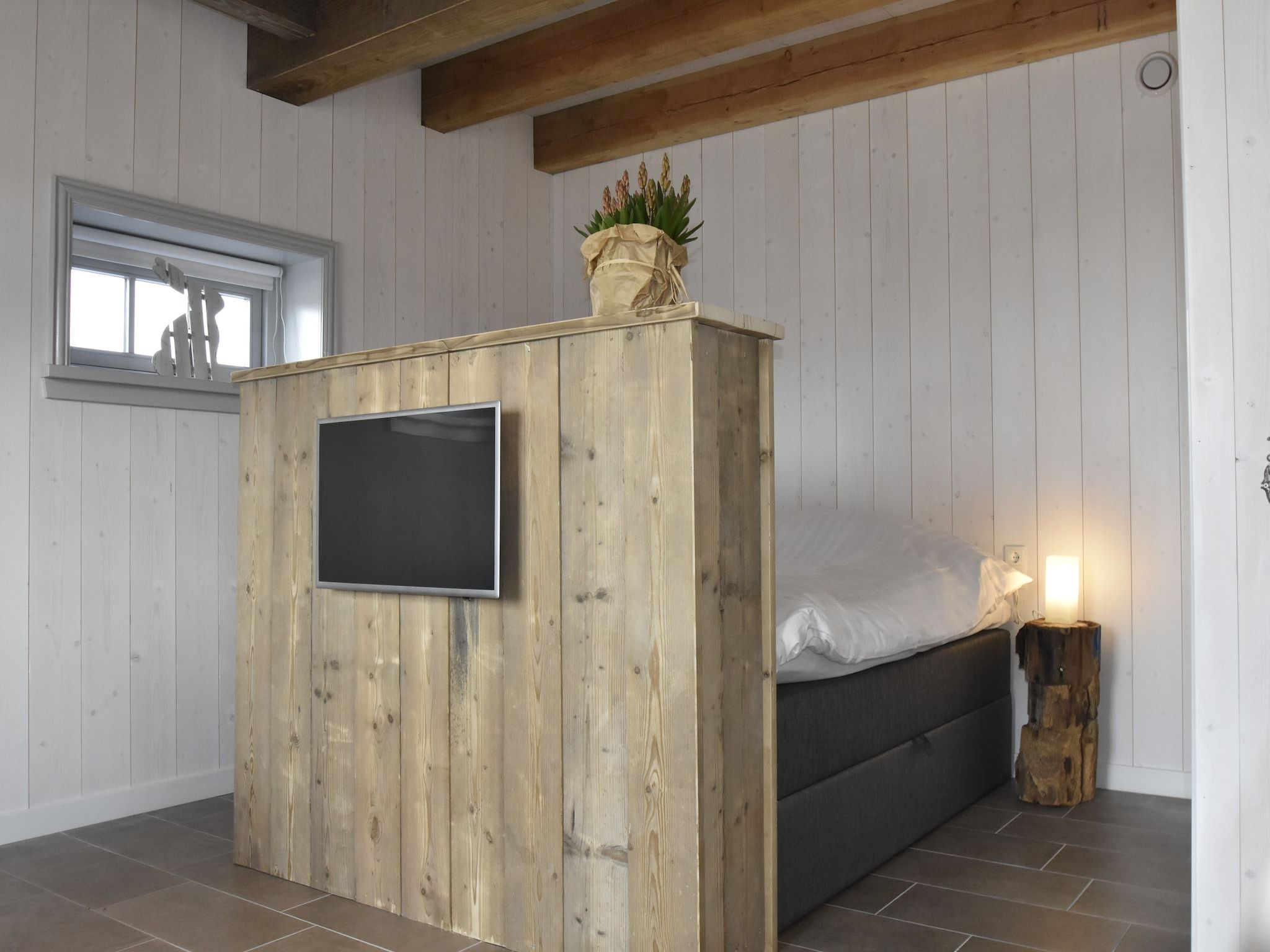 Een slaapkamer van Hazenborgh - Studio Eb in Callantsoog