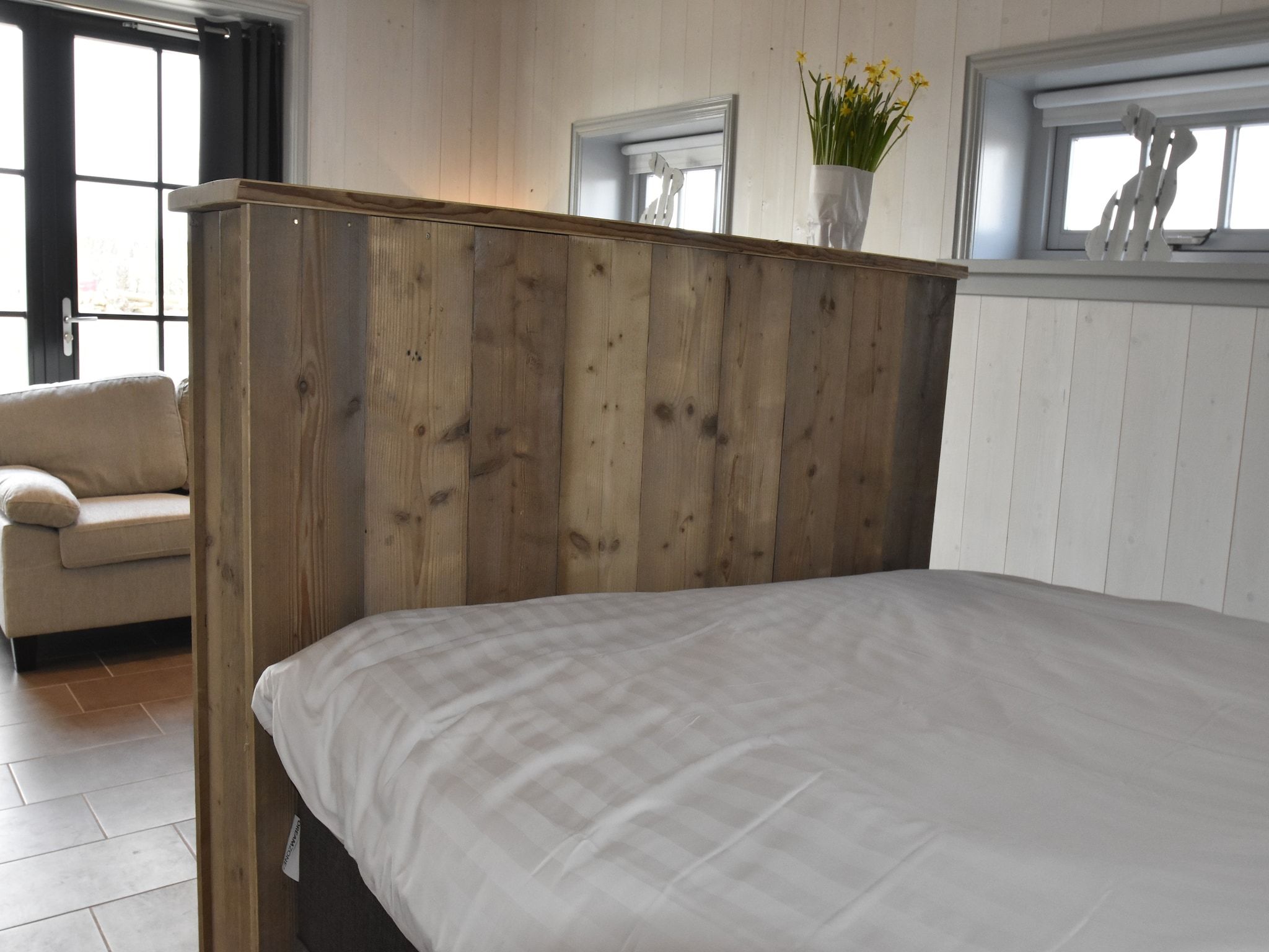 Een slaapkamer van Hazenborgh - Studio Eb in Callantsoog