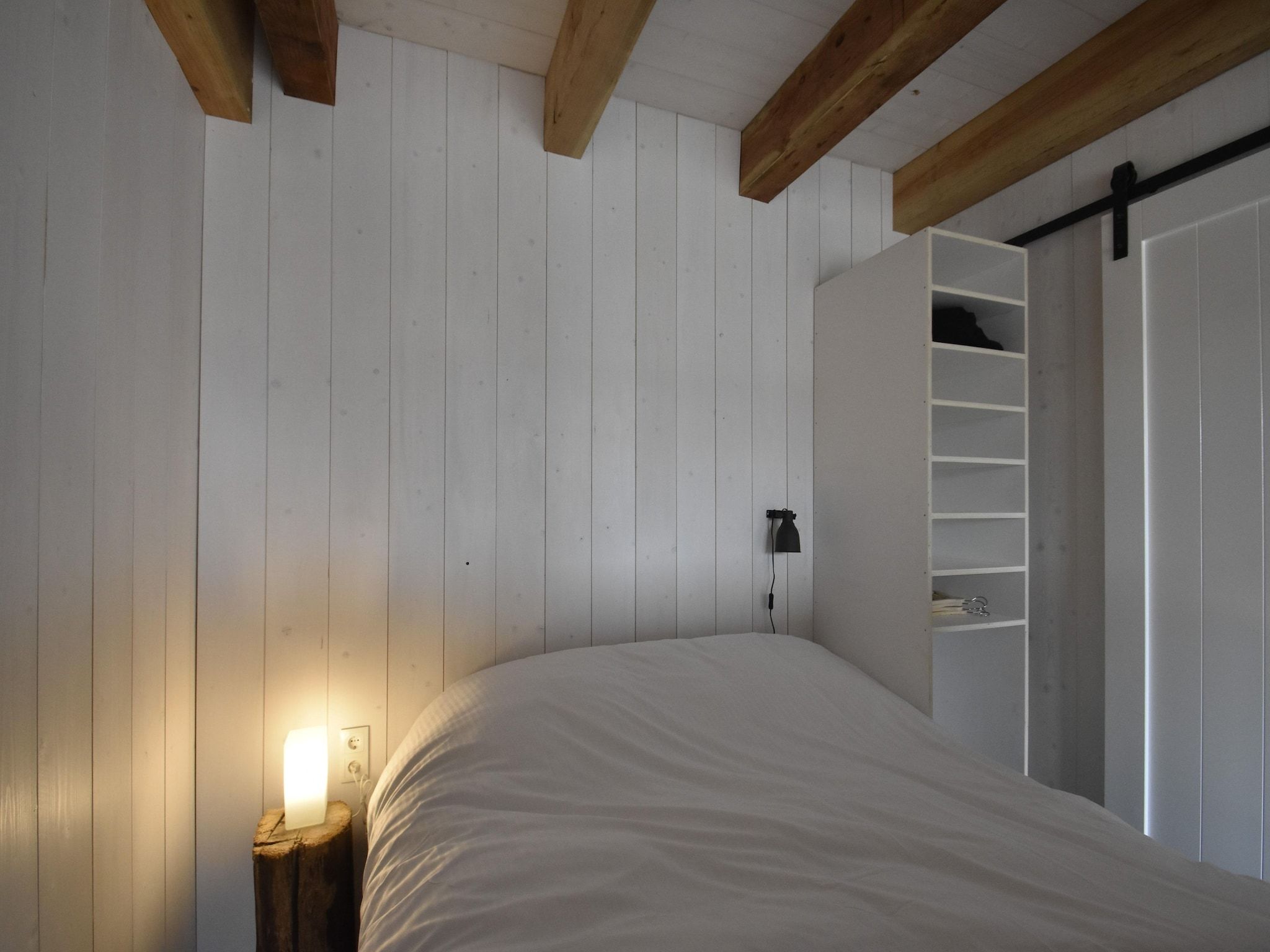 Een slaapkamer van Hazenborgh - Studio Vloed in Callantsoog