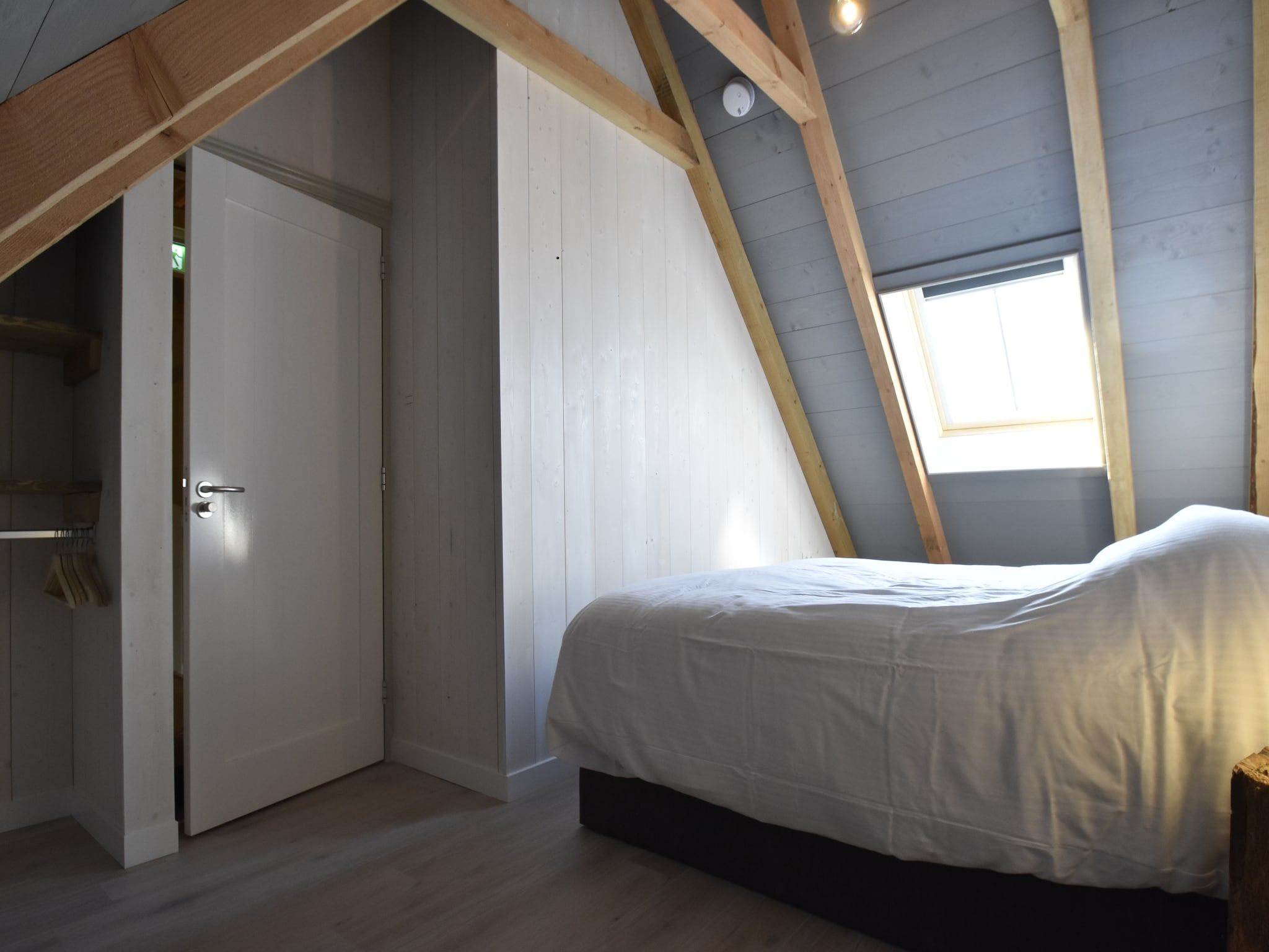 Een slaapkamer van Hazenborgh - Strandhuys in Callantsoog