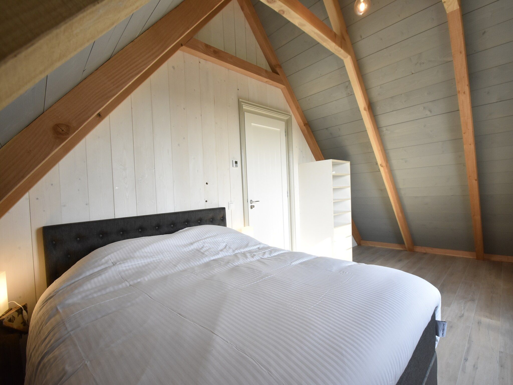 Een slaapkamer van Hazenborgh - Strandhuys in Callantsoog