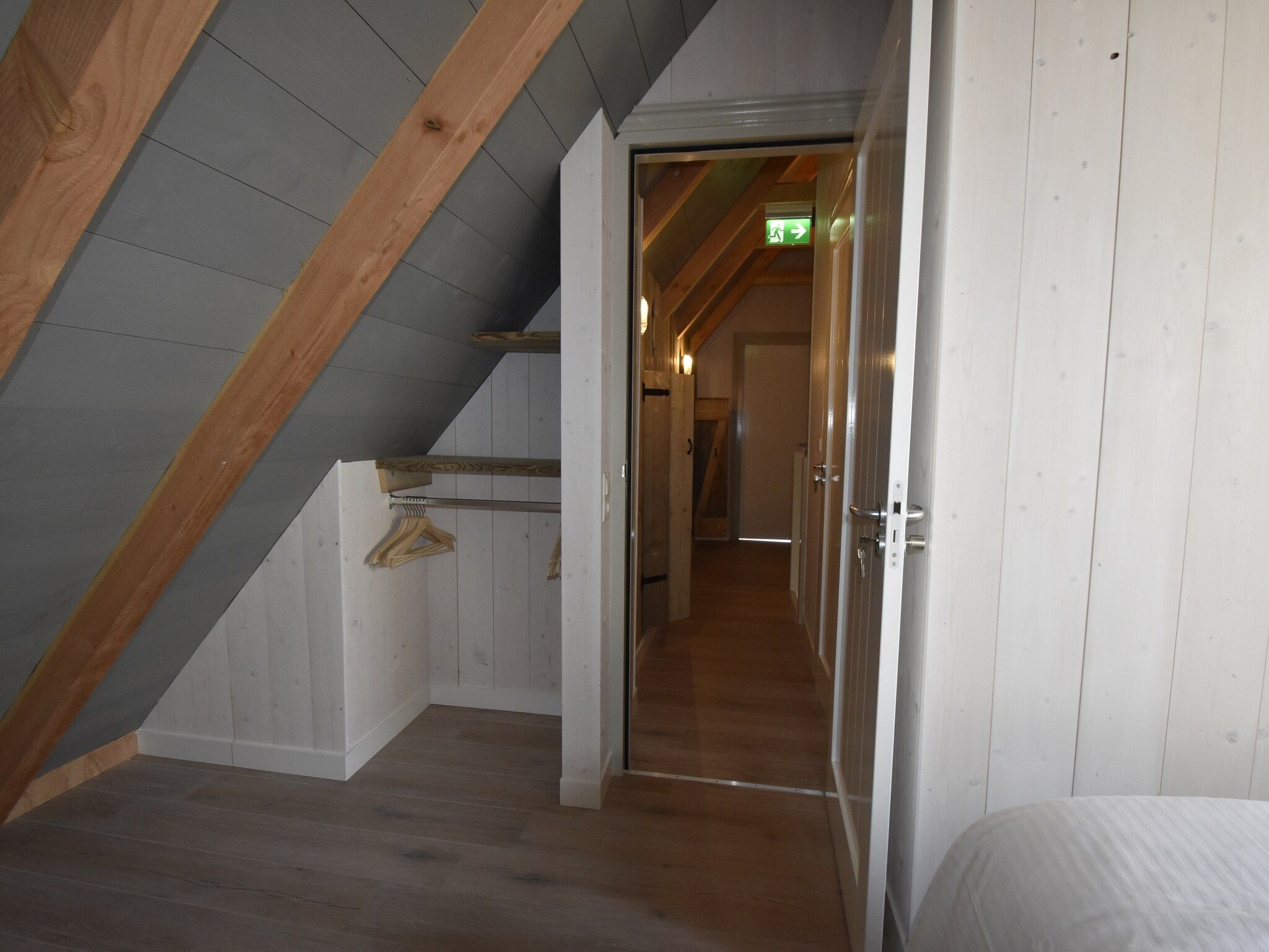 Een slaapkamer van Hazenborgh - Strandhuys in Callantsoog